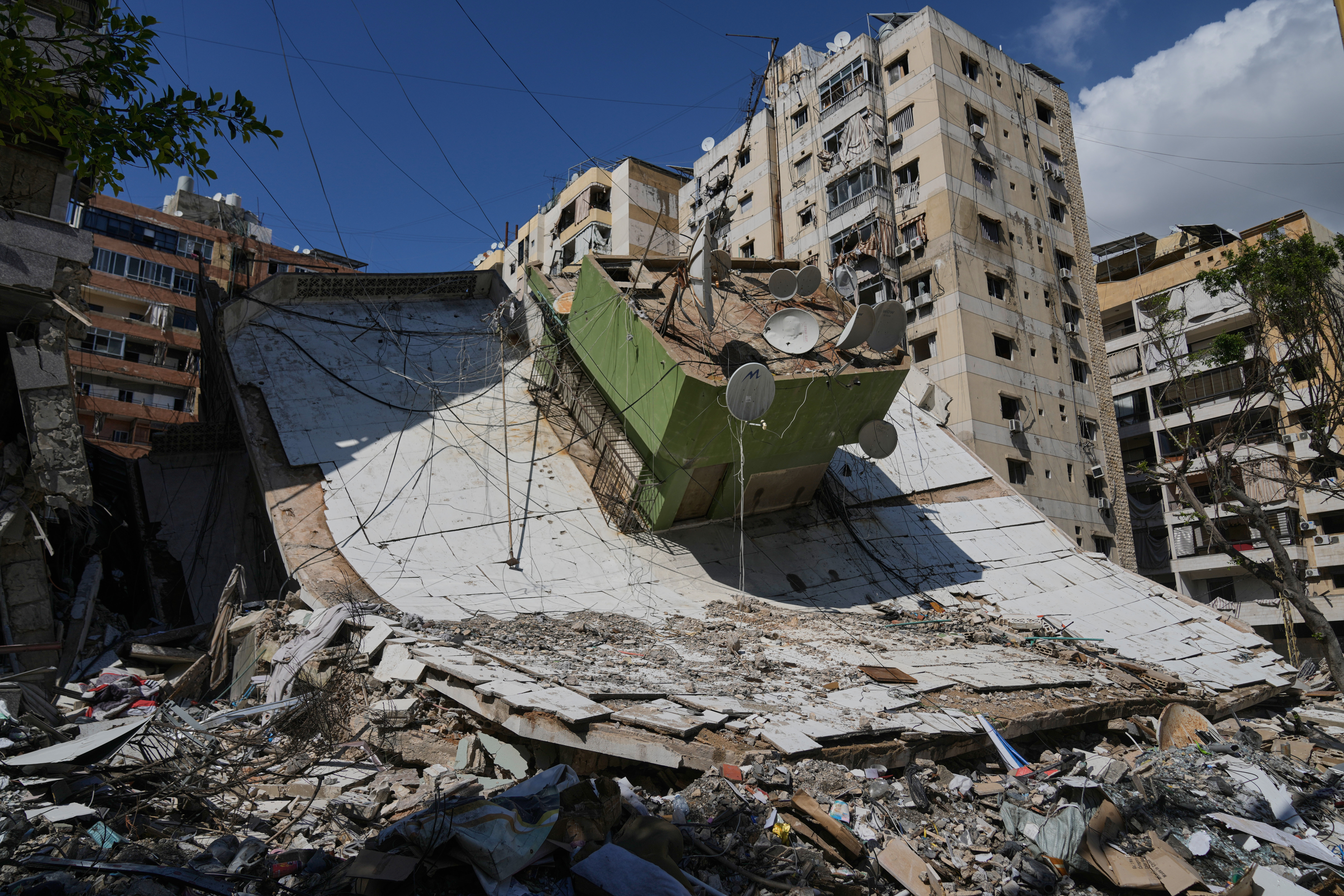 A building destroyed in a previous Israeli airstrike is seen in Dahiyeh, Beirut's southern suburbs, Lebanon, Wednesday, May 6, 2026.