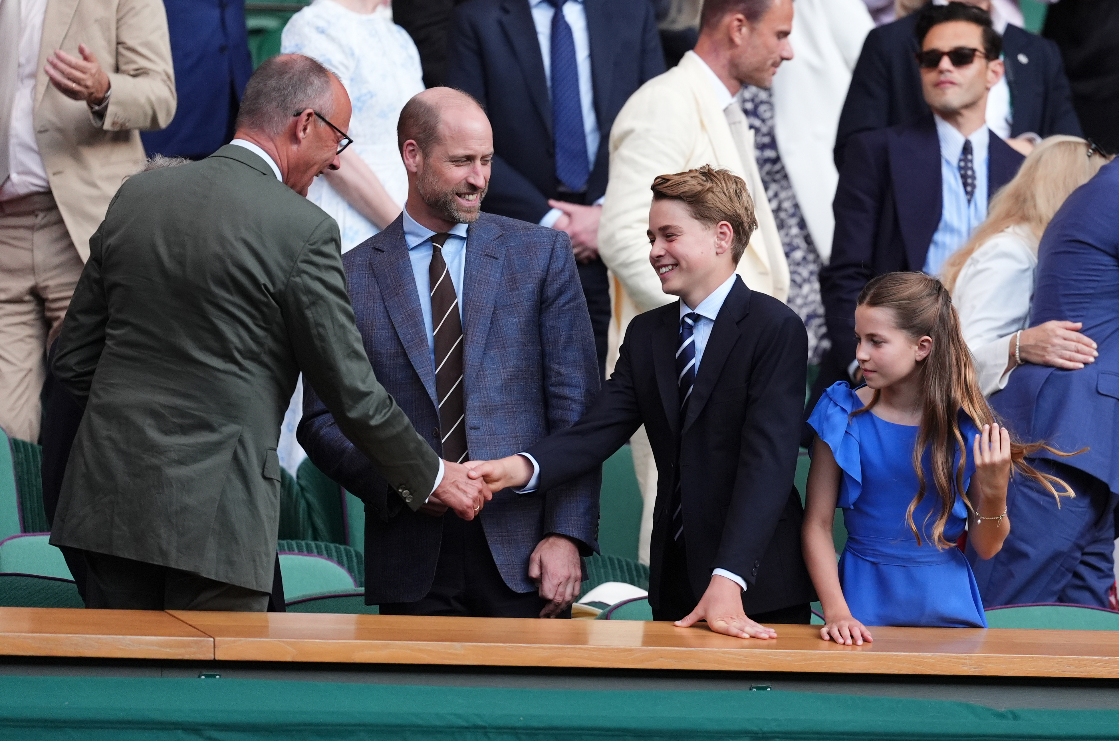 Prince William joined his wife Kate and two of their children for the men's final at Wimbledon