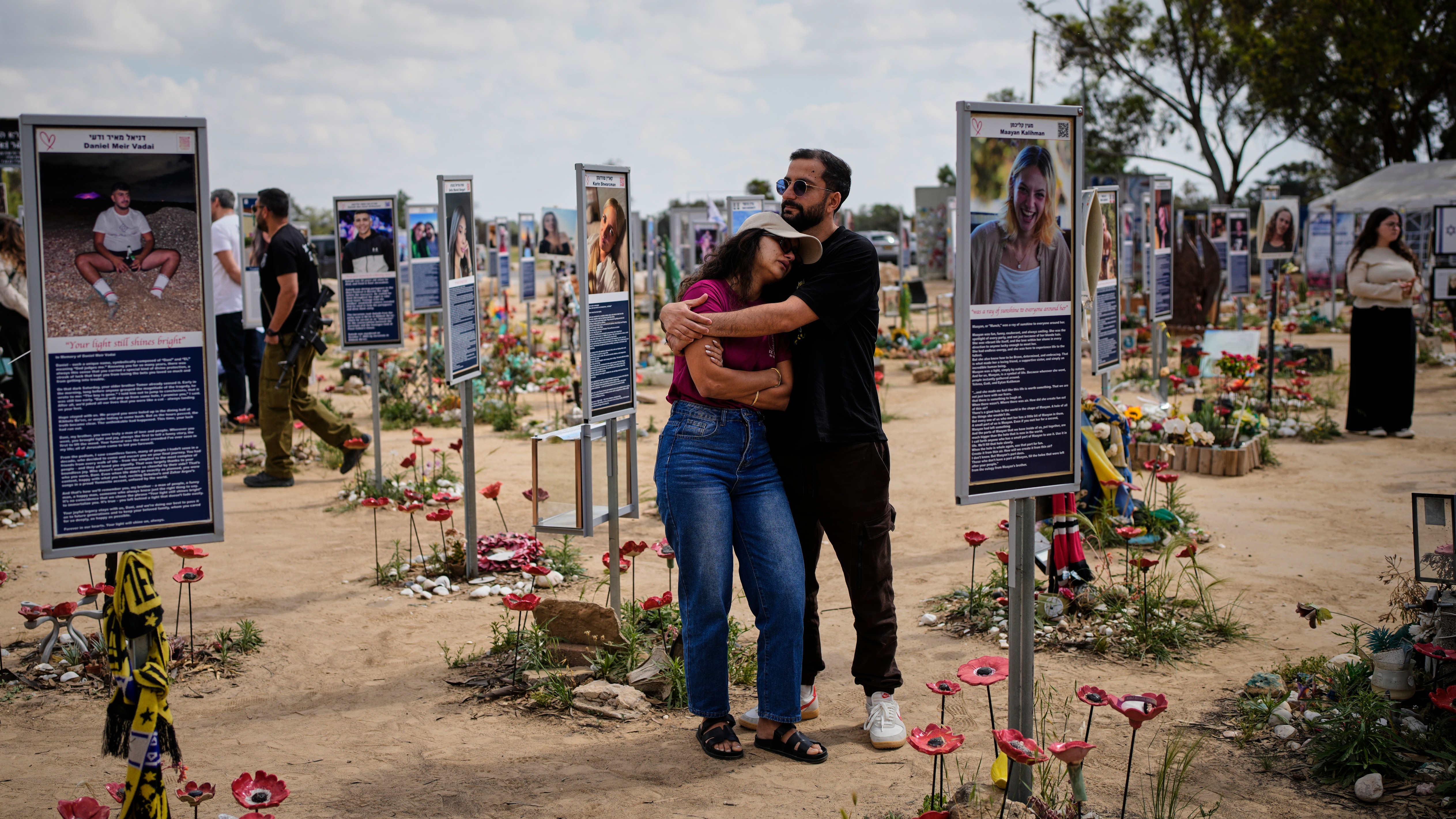 People mark Israel's annual Memorial Day at the site of the Nova music festival, where hundreds of revelers were killed and abducted in the Oct. 7, 2023 Hamas attack, near Kibbutz Reim in southern Israel, April 21, 2026.