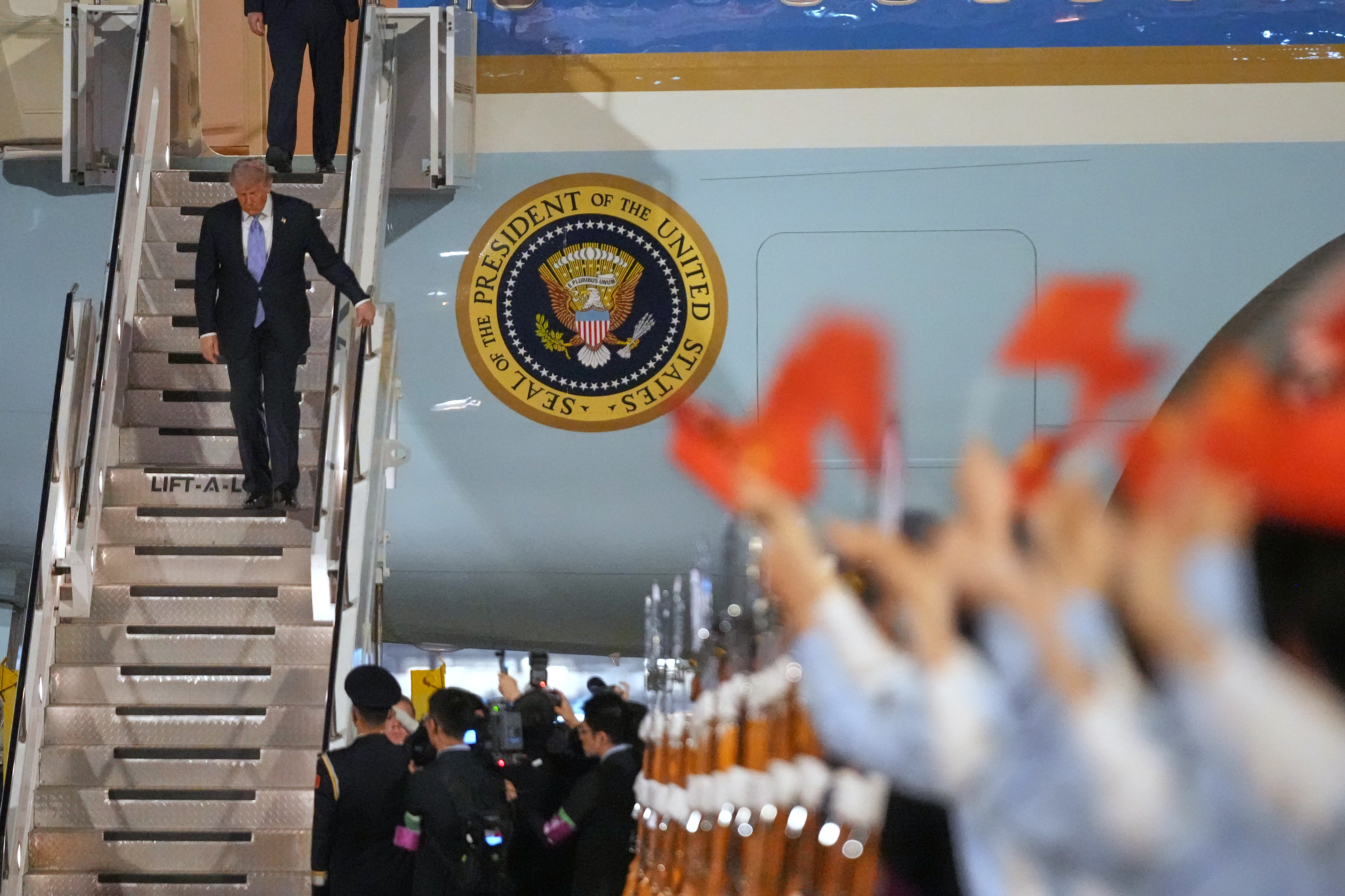 President Donald Trump arrives on Air Force One in Beijing. 