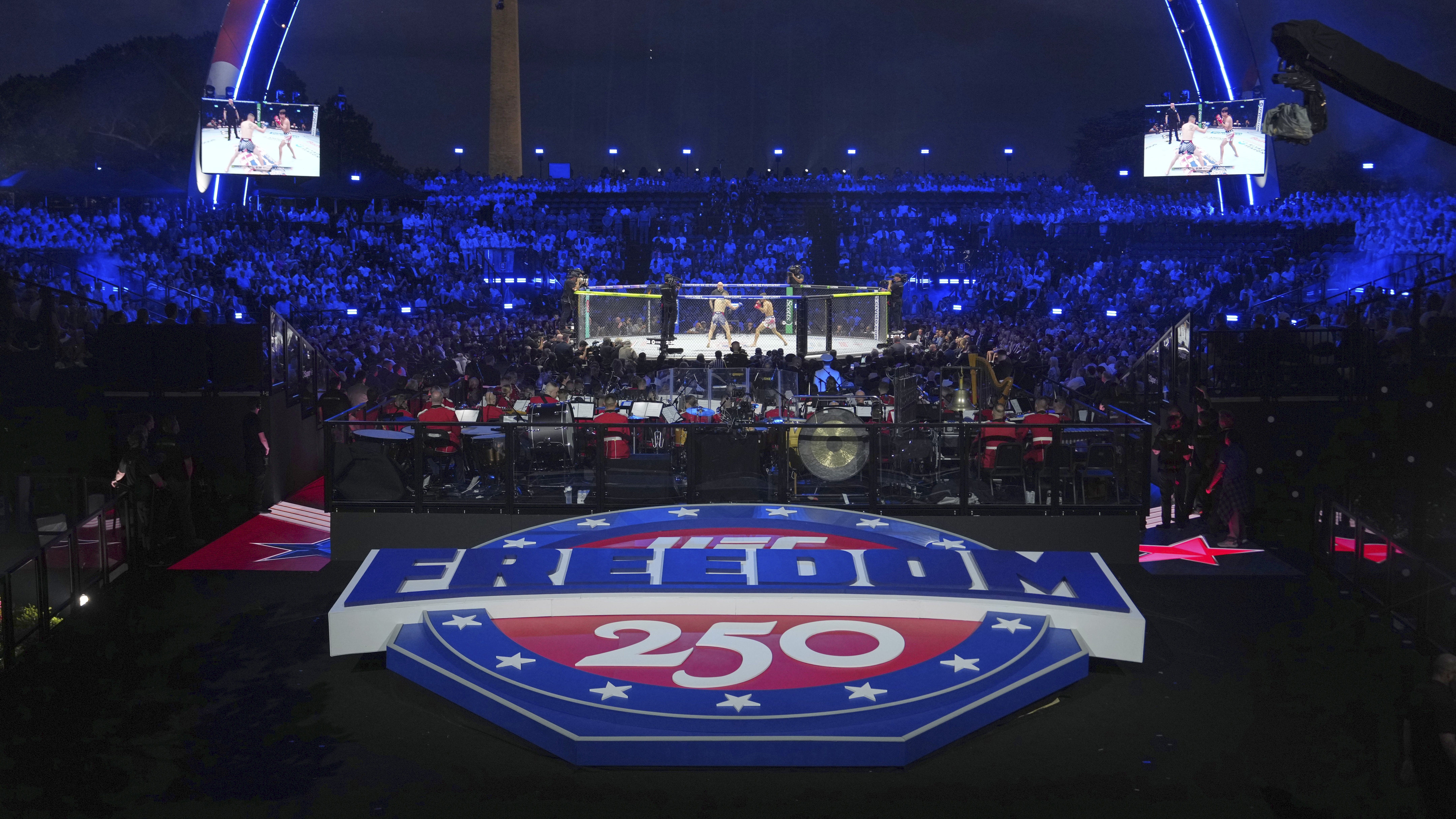 Featherweight fighters Diego Lopez and Steve Garcia in the ring during the first fight at UFC Freedom 250 on the South Lawn of the White House, Sunday, June 14, 2026, in Washington.