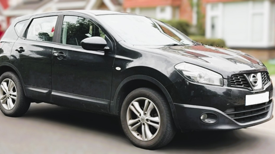 A 2010 black Nissan Qashqai.