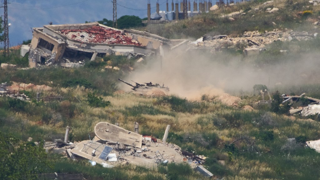Israeli soldiers drive a tank in southern Lebanon as seen from northern Israel, Sunday, May 31, 2026.