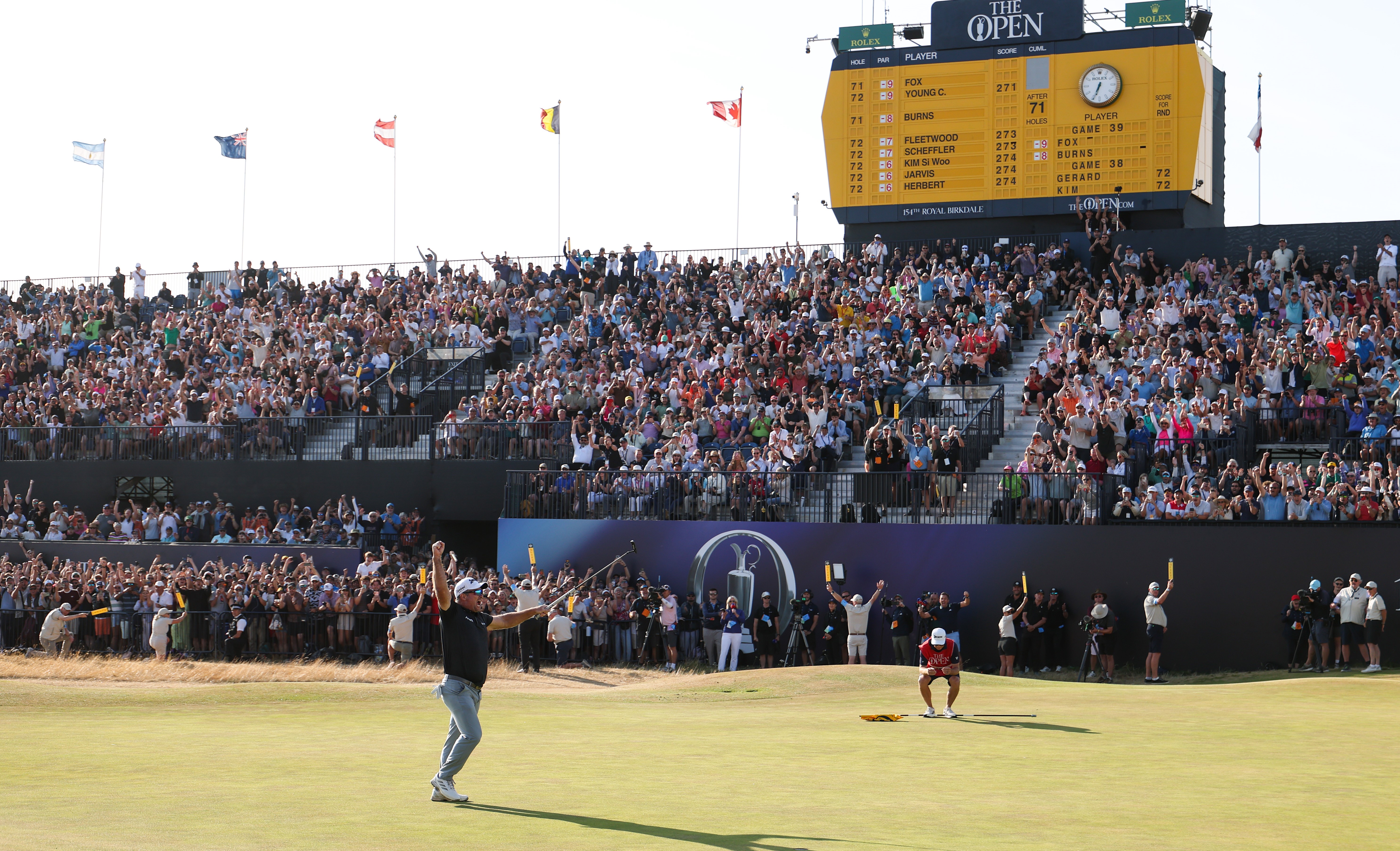 Ryan Fox celebrates after sinking the putt that won him the Open.