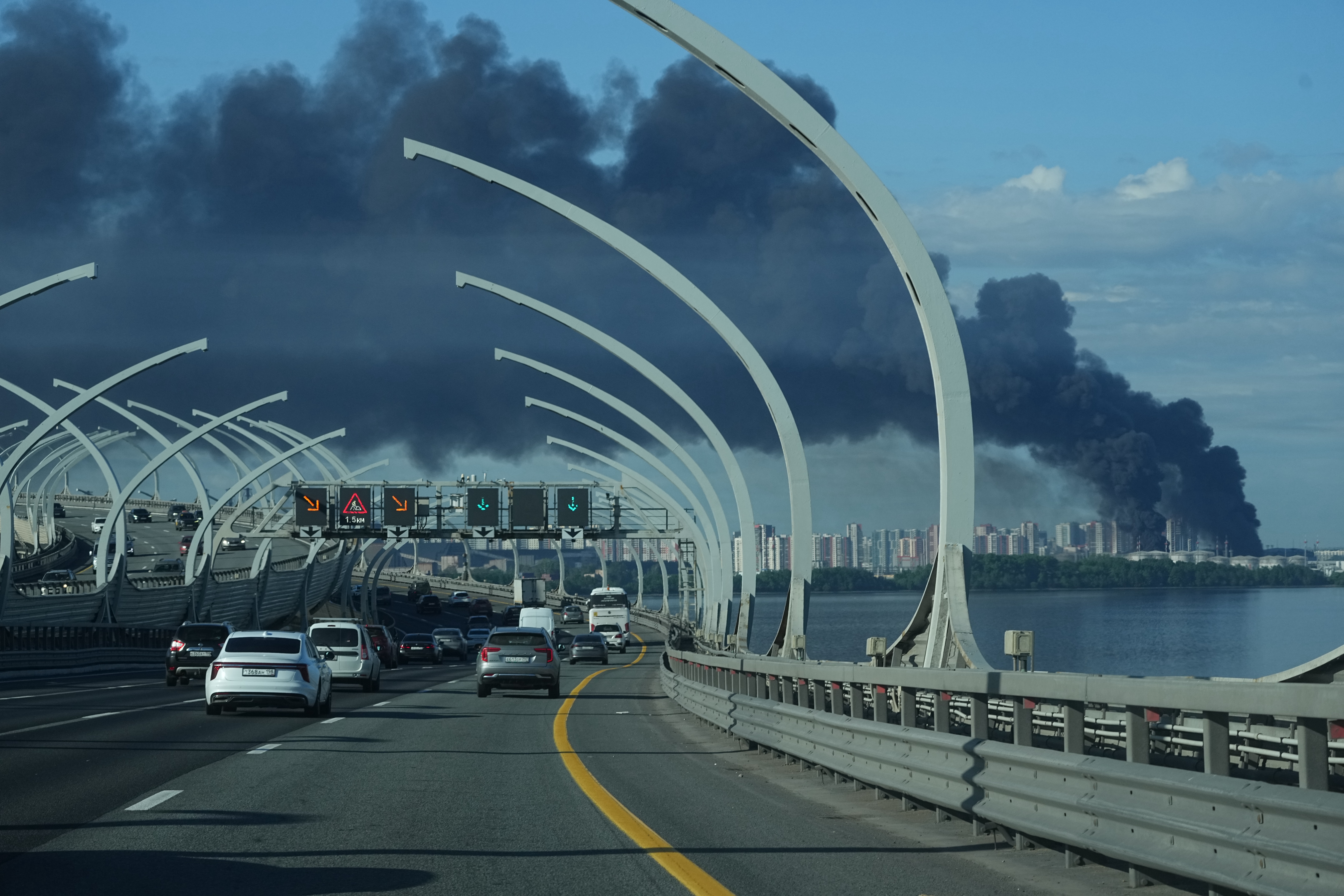 A plume of black smoke is seen over the port of St. Petersburg, Russia, Wednesday, June 3, 2026, after a Ukrainian drone attack.