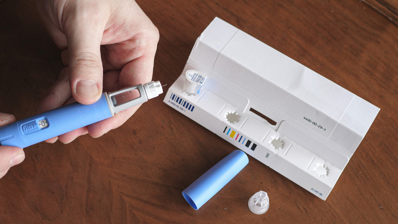 An injection of Ozempic is prepared (file photo)