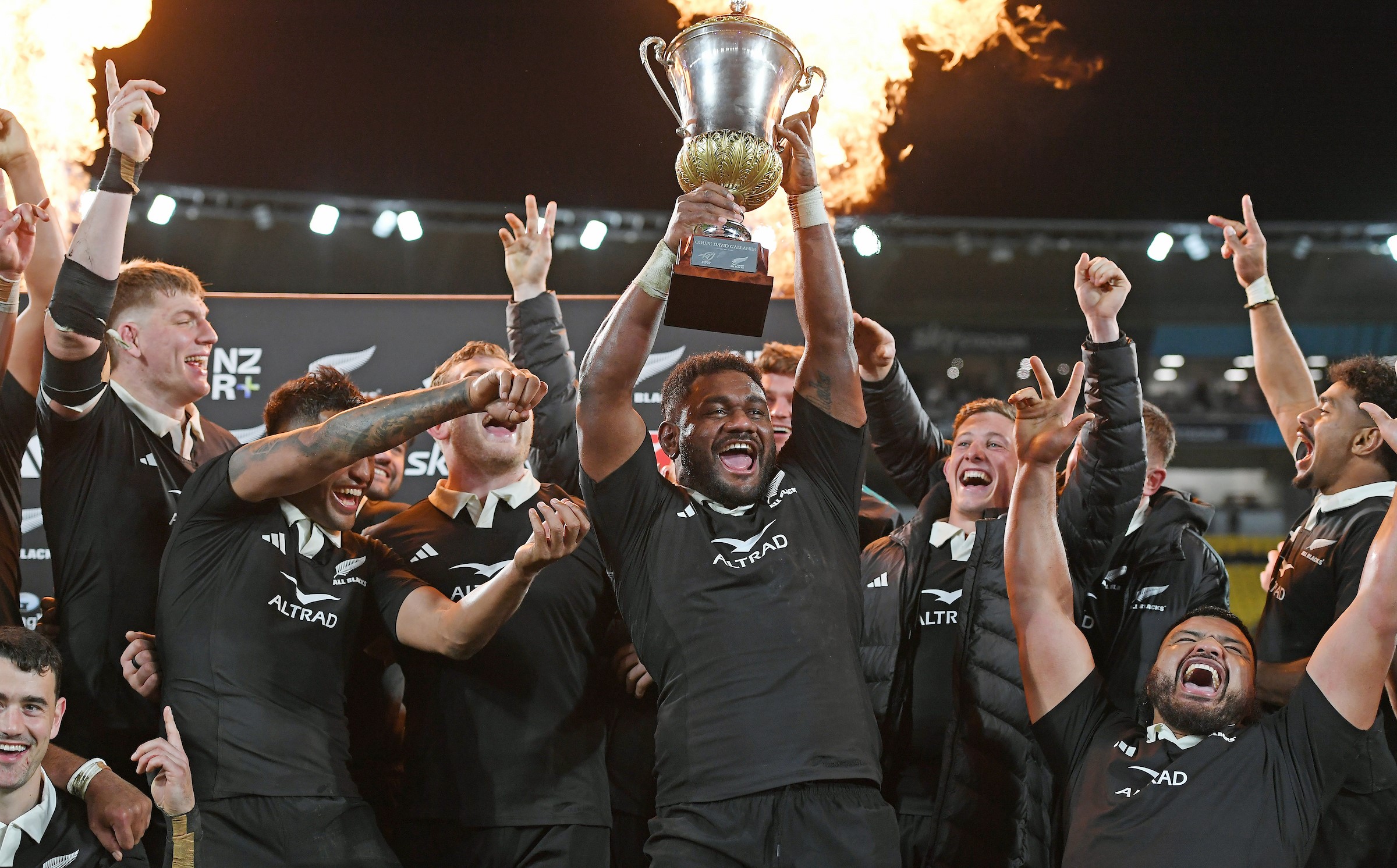 Timoci Tavatavanawai and the All Blacks celebrate winning back the Dave Gallaher Trophy against France in Wellington.