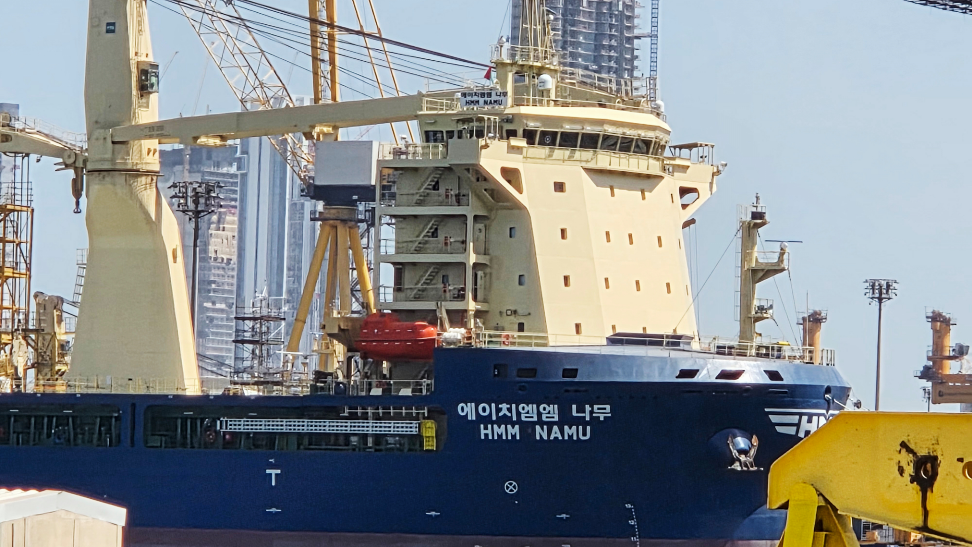 The South Korean-operated vessel HMM NAMU is docked after being damaged from a fire following an explosion in the Strait of Hormuz.
