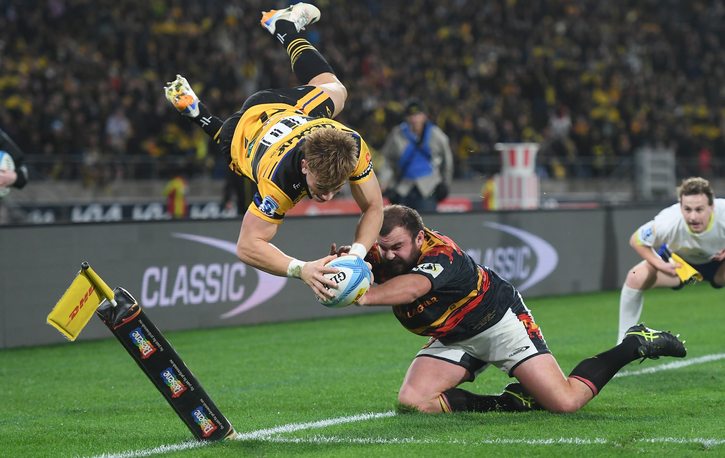 Ruben Love takes flight to score his second try in the grand final against the Chiefs.