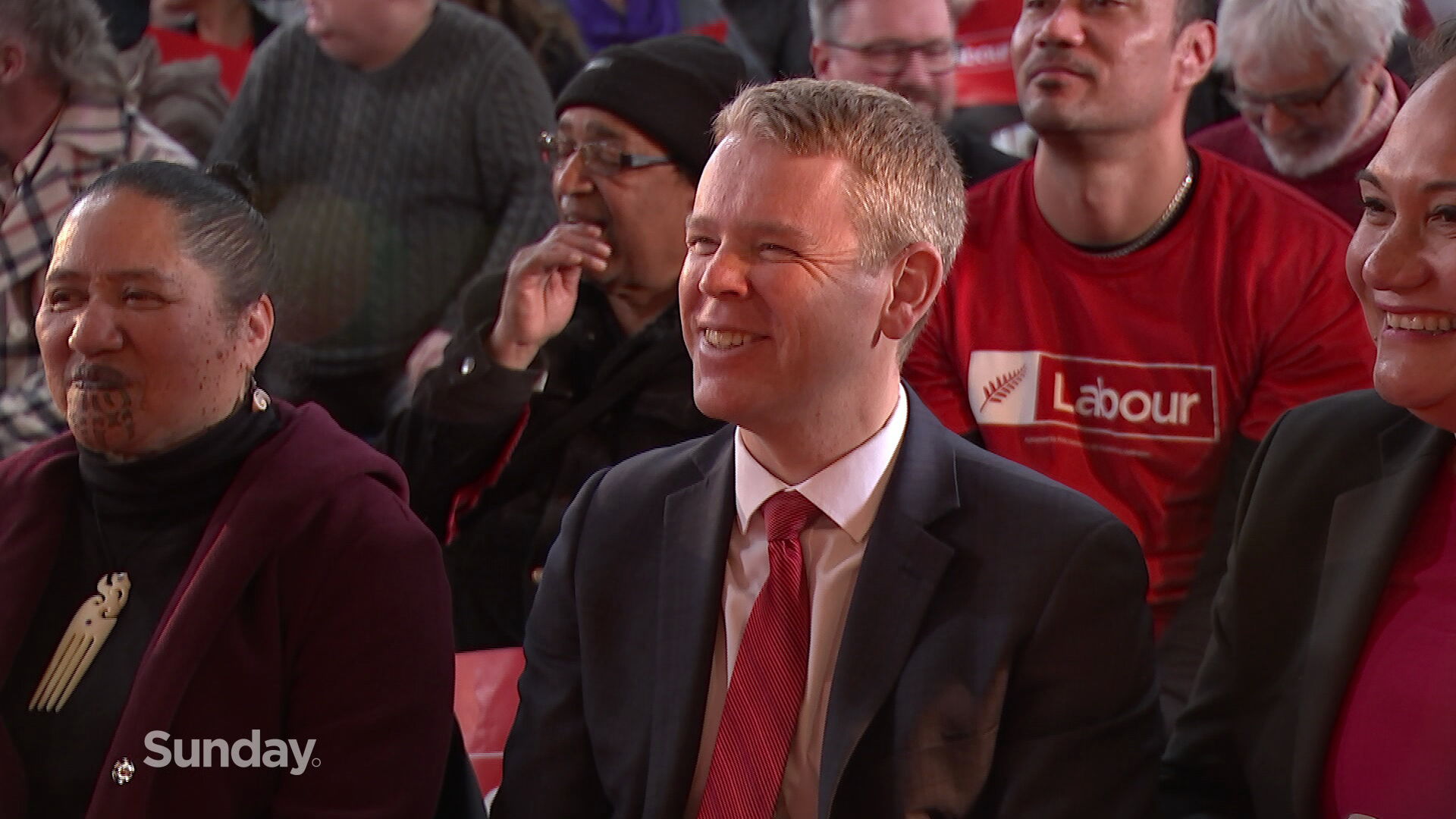 Chris Hipkins sits with others from the Labour Party ahead of the 2023 election. 