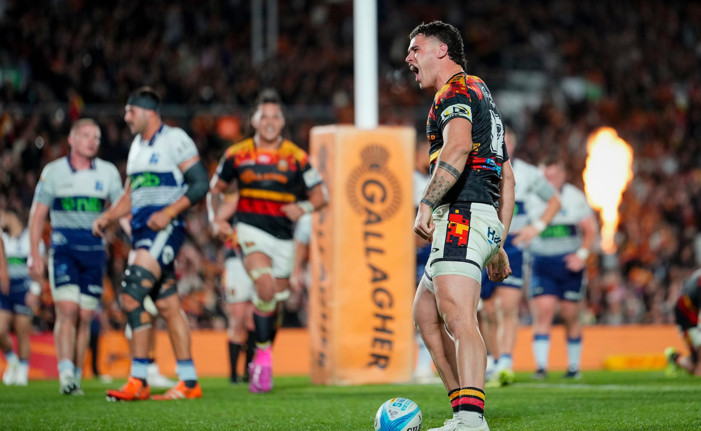 Chiefs player Reon Paul celebrates after scoring against the Blues in Hamilton last weekend.