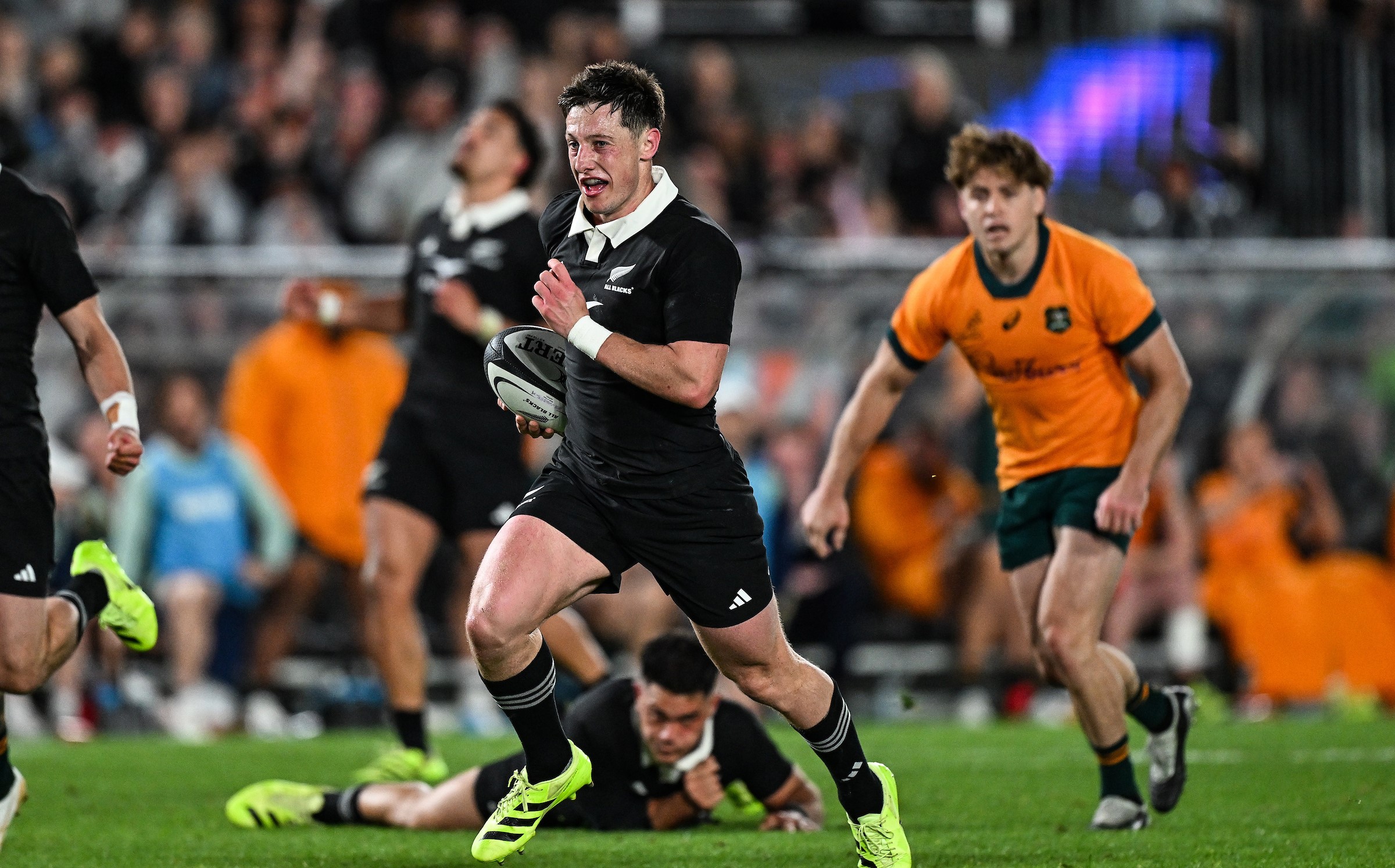 Cam Roigard runs in for his second try against the Wallabies at Eden Park.