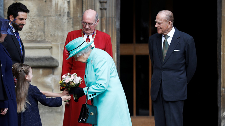 The Queen and Prince Philip, Duke of Edinburgh leave the Easter Day service at St George's Chapel on April 16, 2017 in Windsor, England.