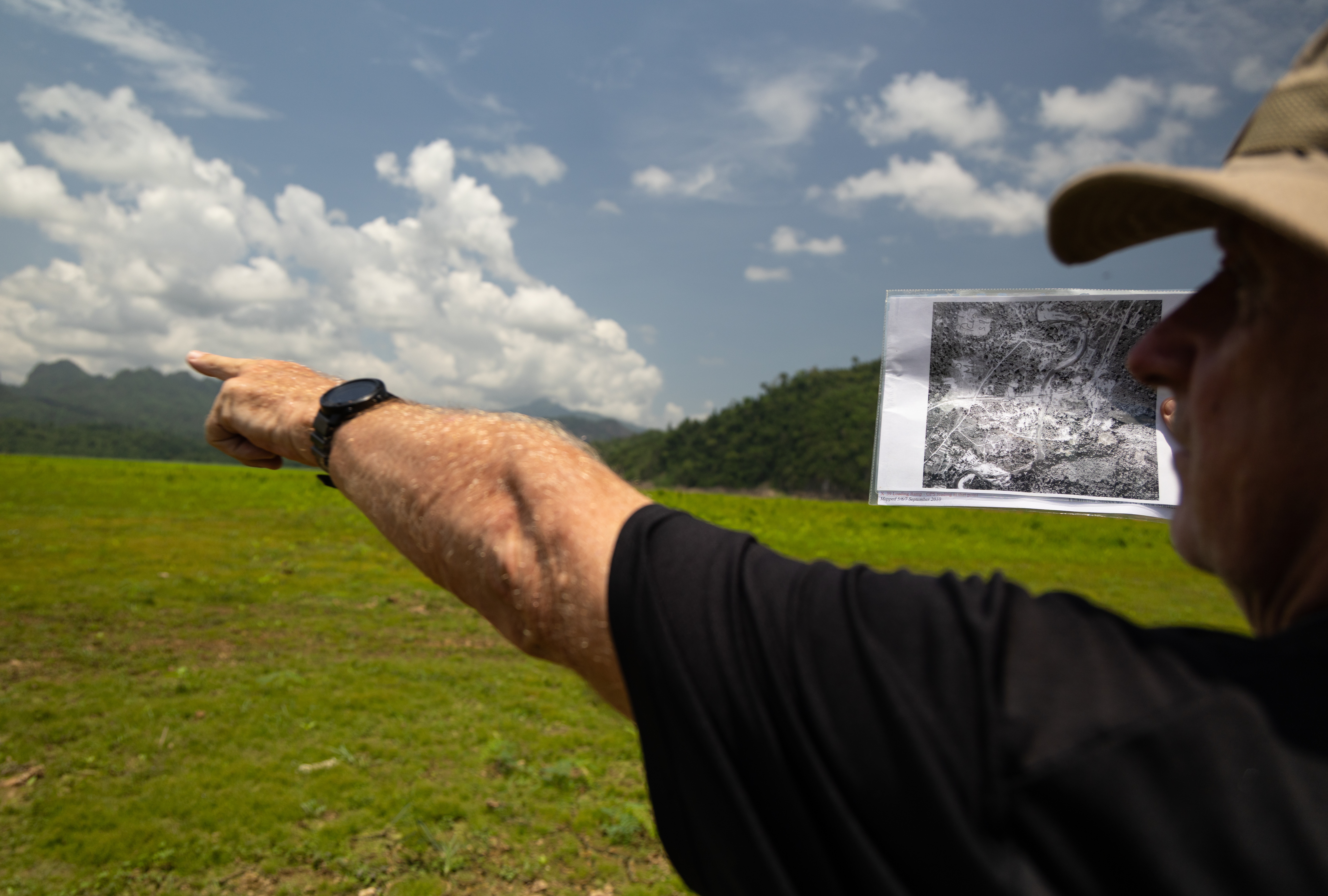 Andrew Snow, a researcher with the Thailand-Burma Railway Centre, uses historic aerial photographs from The National Archives in London to map out the layout of Nithe Station