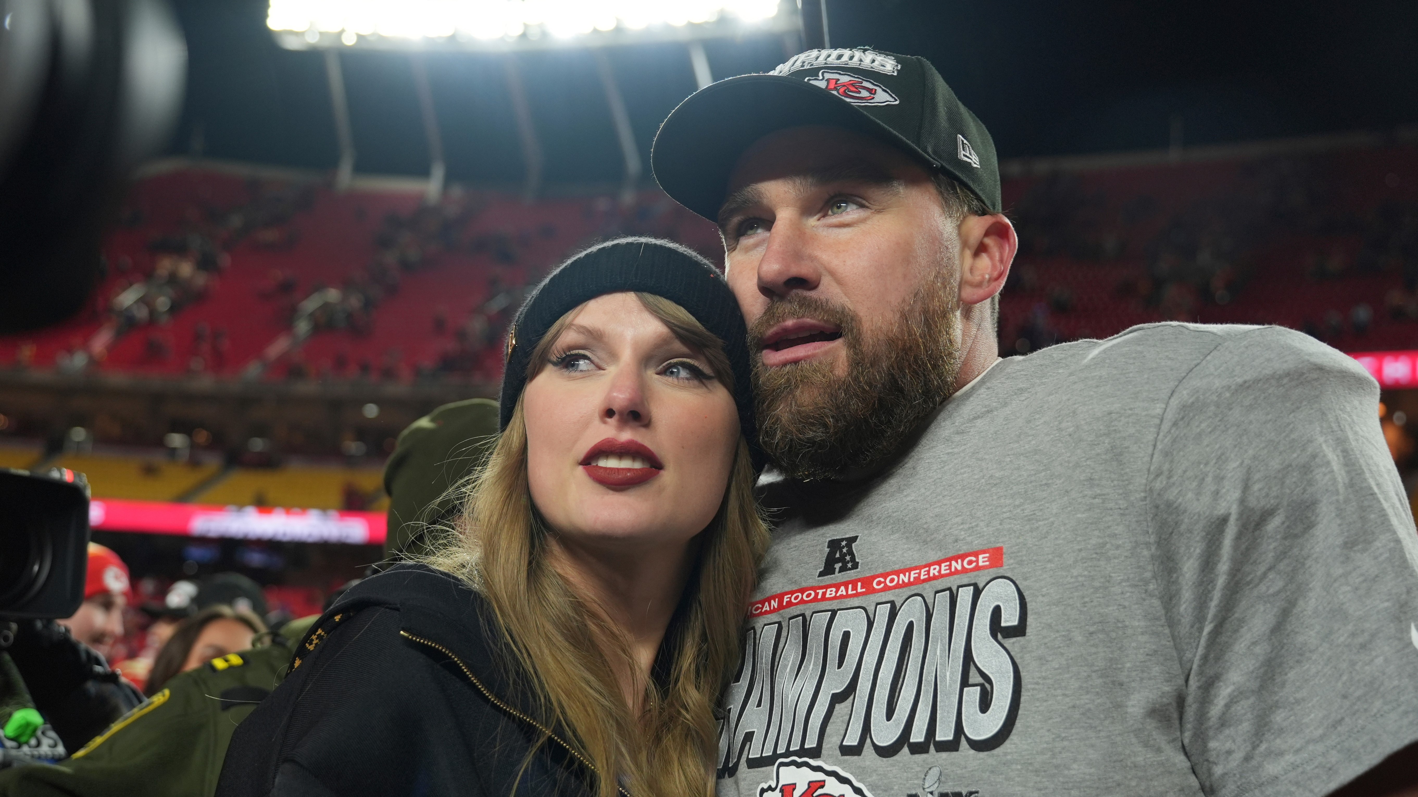 Kansas City Chiefs tight end Travis Kelce, right, is congratulated by Taylor Swift as they celebrate the Chiefs' victory over the Buffalo Bills in the AFC Championship NFL football game, Jan. 26, 2025, in Kansas City, Mo.