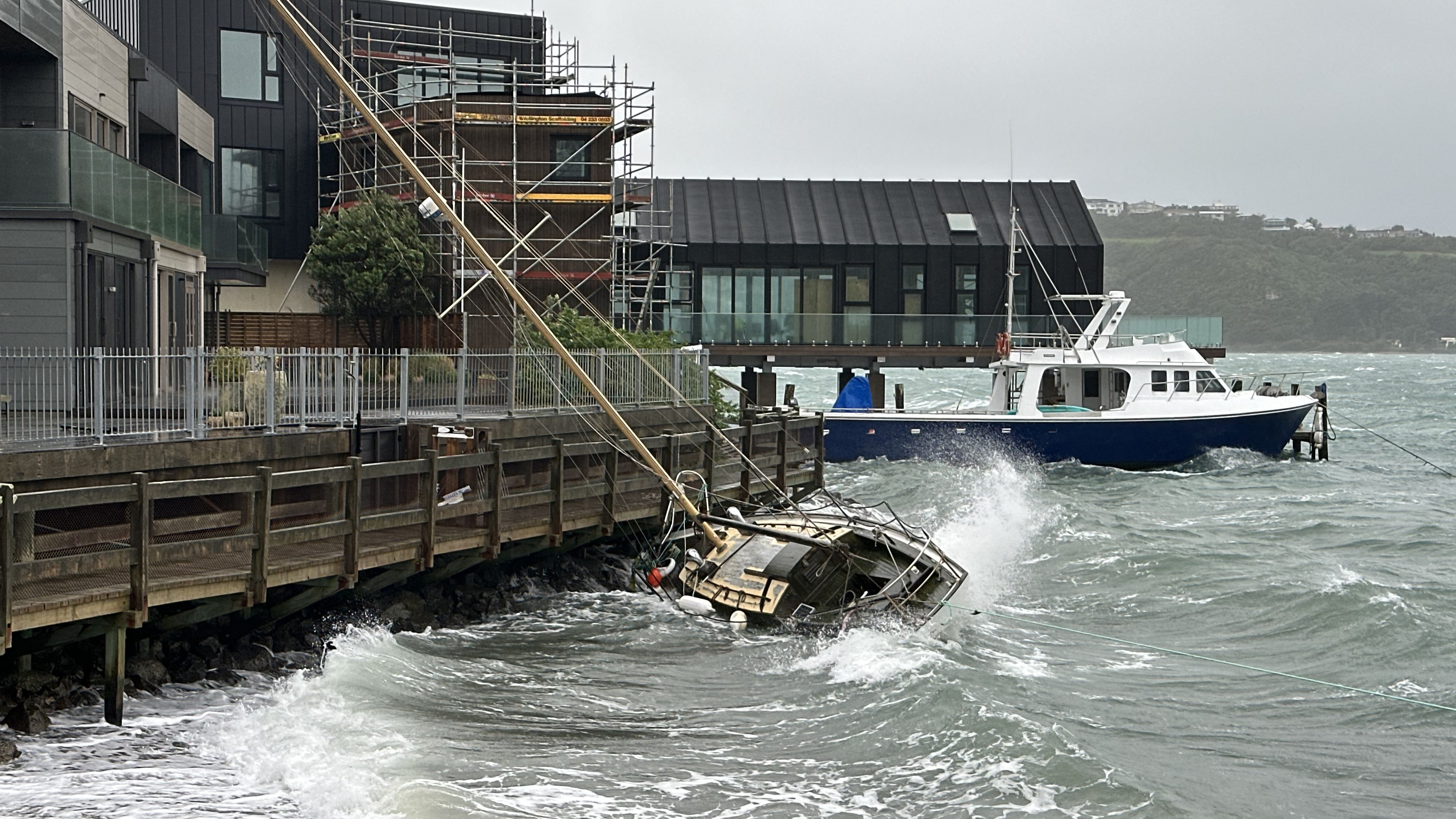 A boat turned on its side at Evans Bay Pde, Hataitai / Reuben Smith 