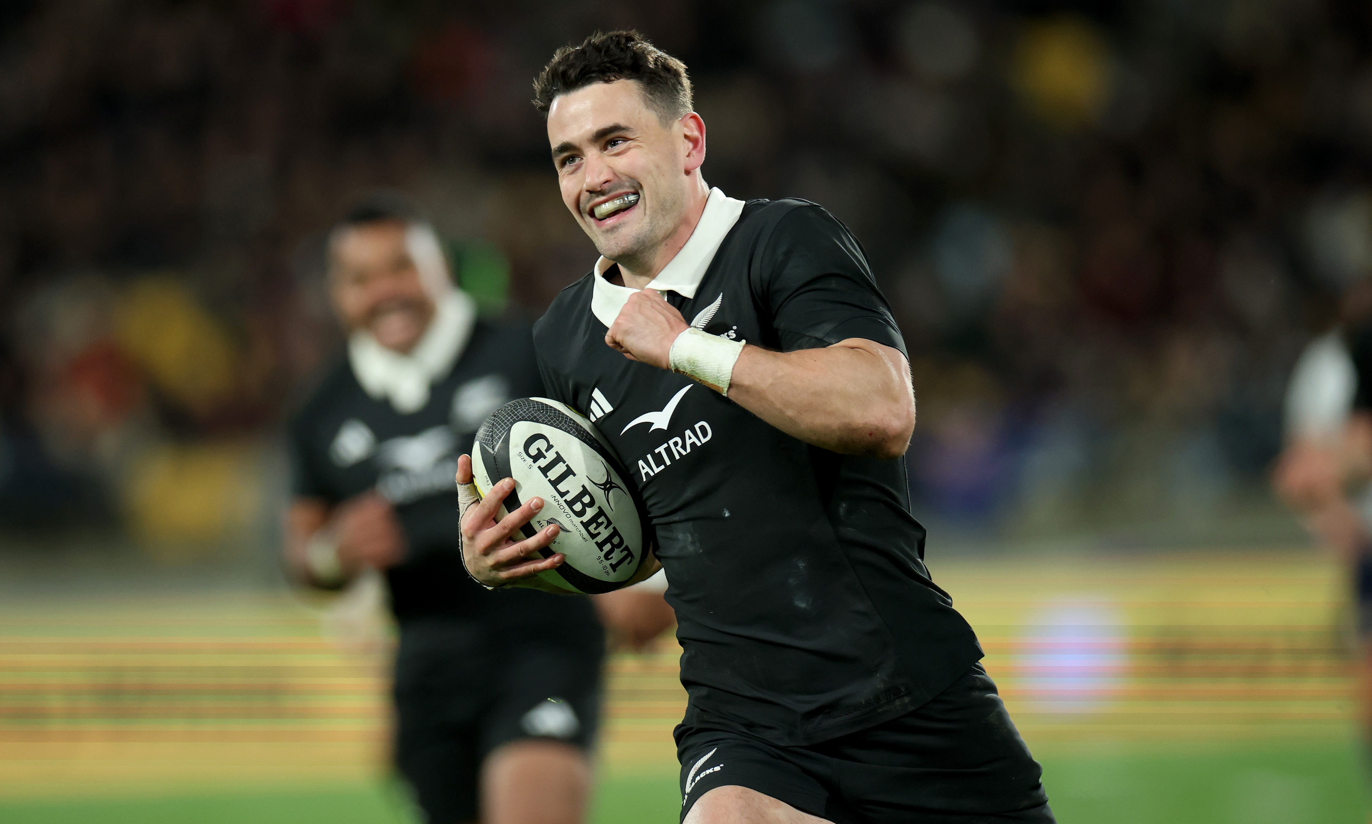 Will Jordan scores one of his three tries against Italy in Wellington as he makes history for the All Blacks.