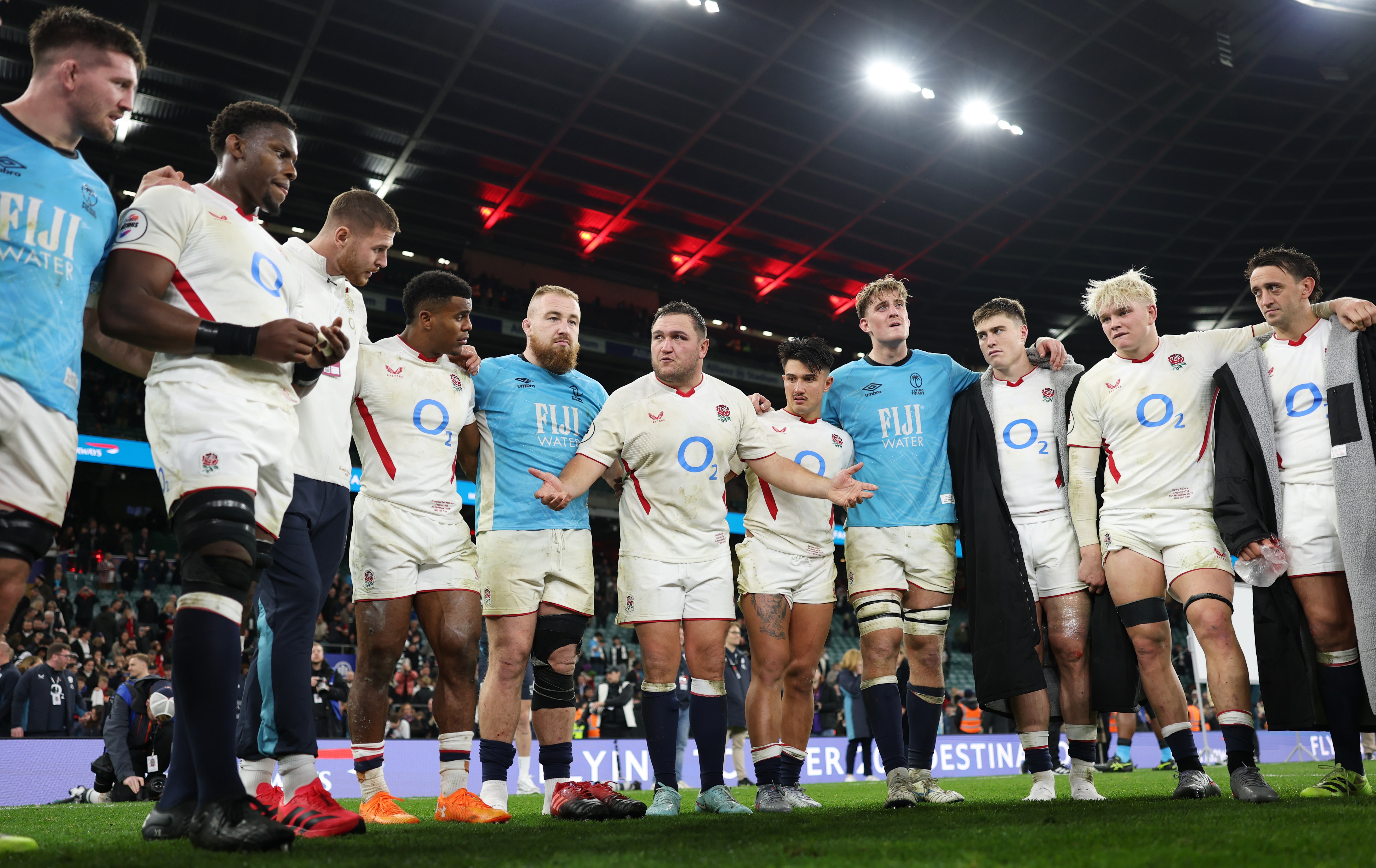 Jamie George speaks to his England teammates after their victory over Fiji at Twickenham.