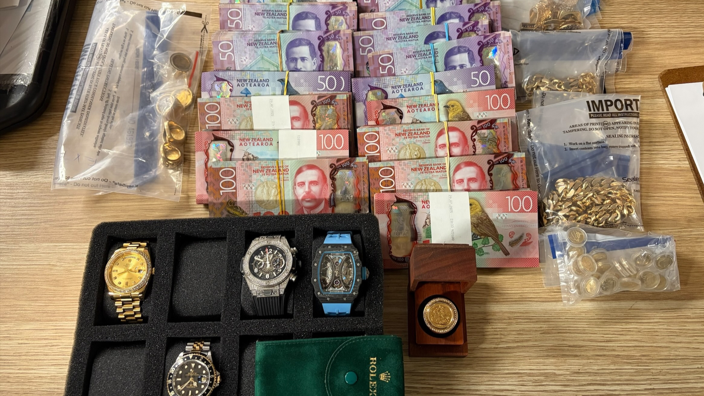 Overall, more than $150,000 in cash and approximately $93,000 in jewellery was located.