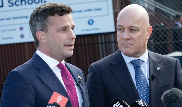 David Seymour (left) wants out of the Paris climate accord, but Christopher Luxon (right), disagrees. (File photo) Photo: RNZ / Angus Dreaver