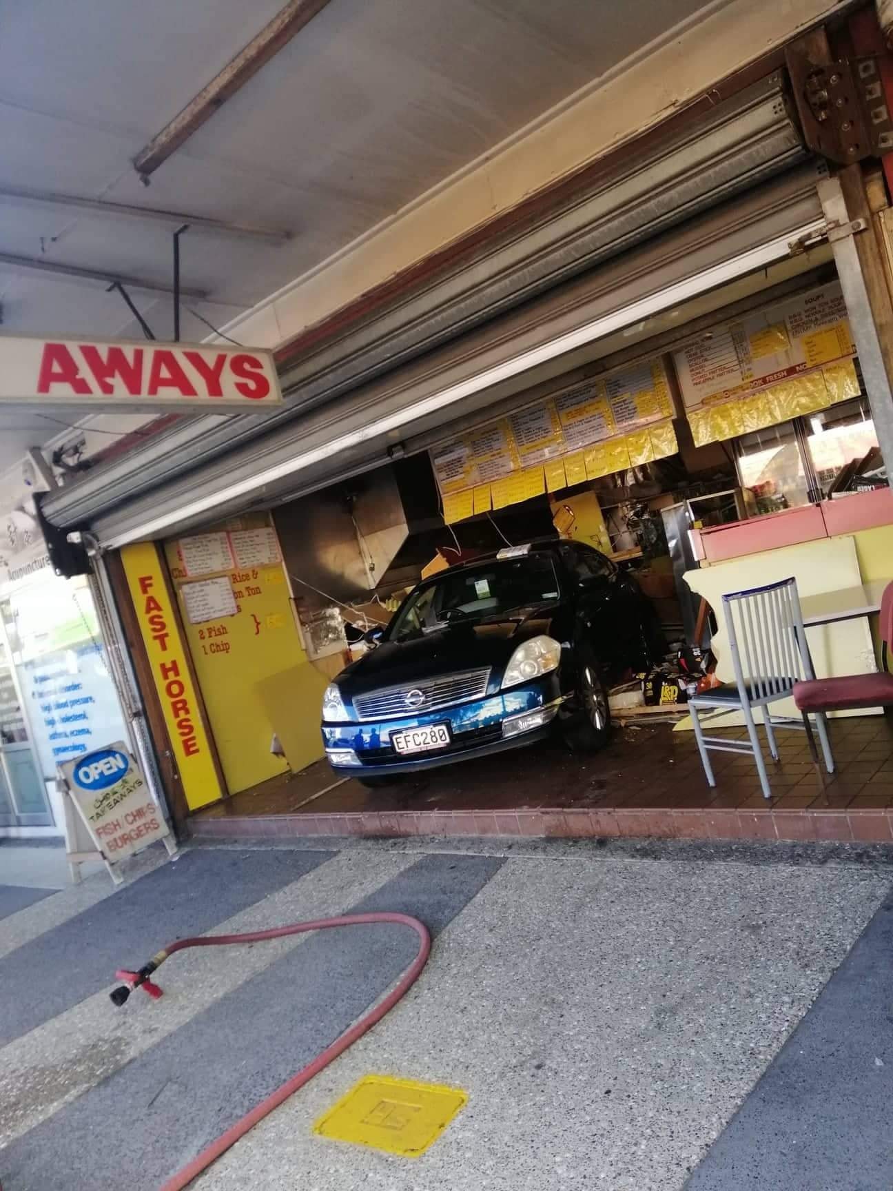 One injured as car backs into South Auckland takeaway shop