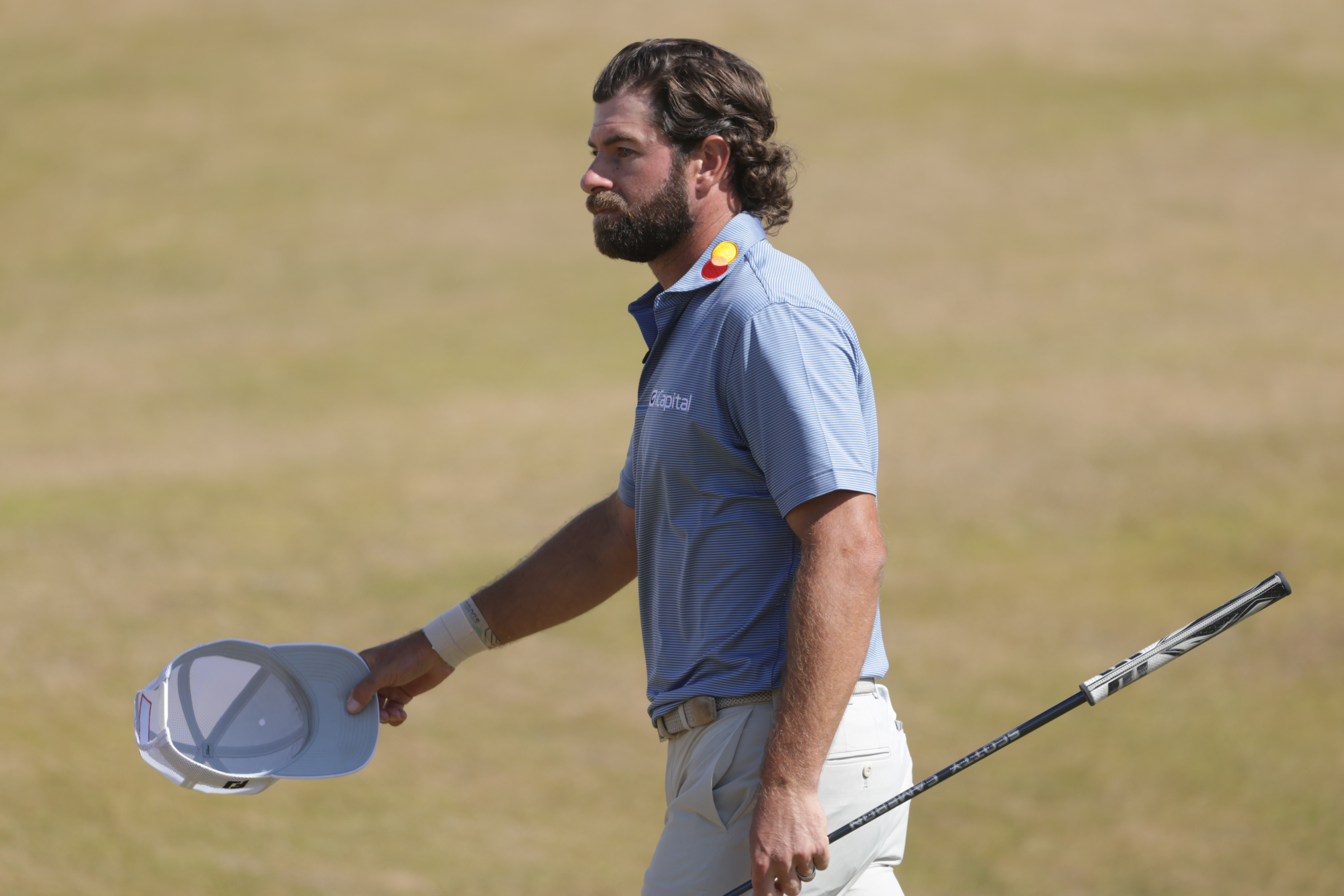 Cameron Young of the United States acknowledges the crowd as he walks off the 18th green after completing his final round during the final day of the British Open Golf championships.
