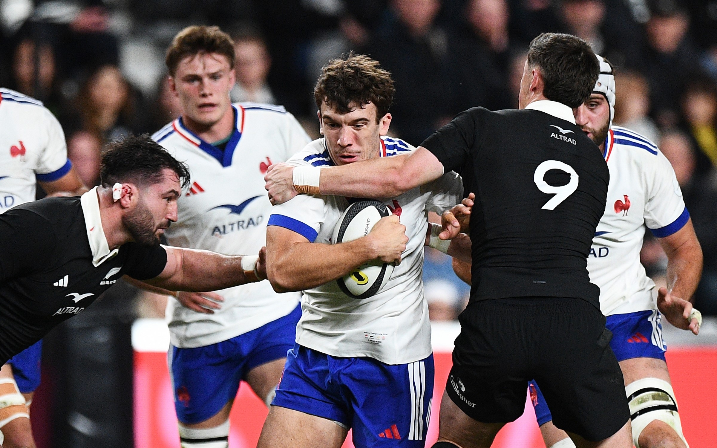 All Blacks halfback Cam Roigard tackles France centre Fabien Brau-Boirie high during the Test in Christchurch.