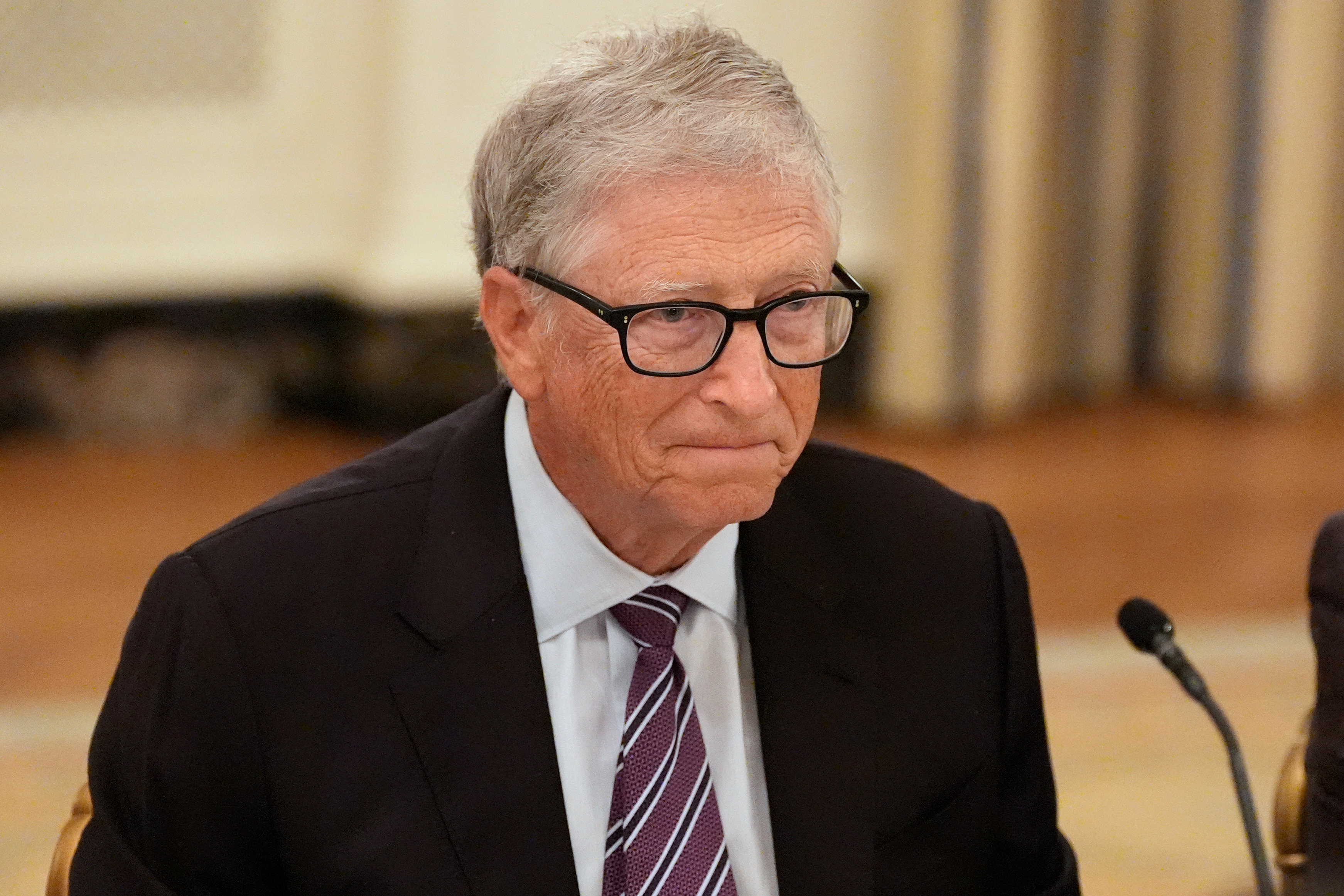 Microsoft's Bill Gates attends a dinner with President Donald Trump in the State Dining Room of the White House, Sept. 4, 2025