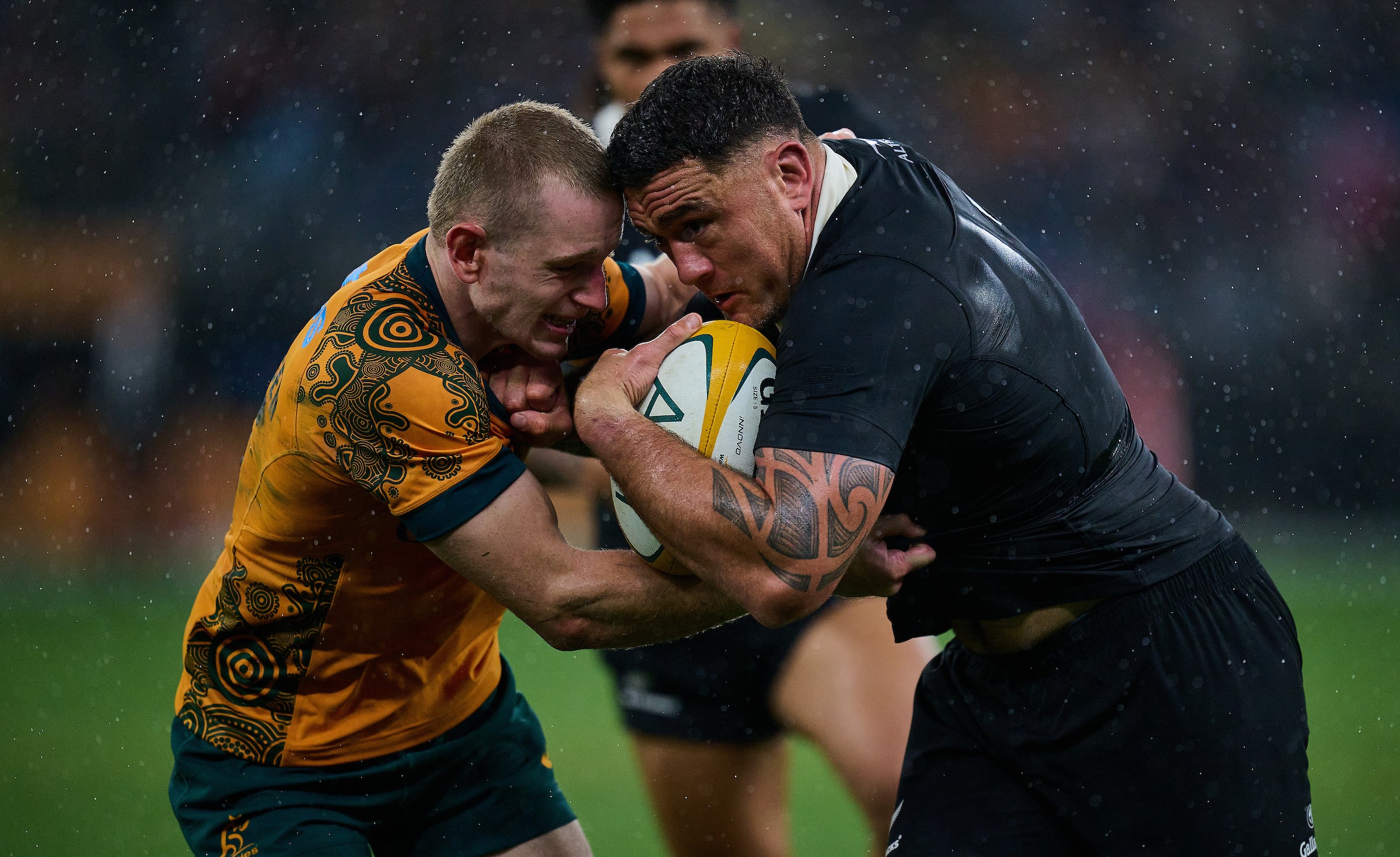 All Blacks hooker Codie Taylor tries to get past Wallabies back Max Jorgensen during New Zealand's win in Perth last year.