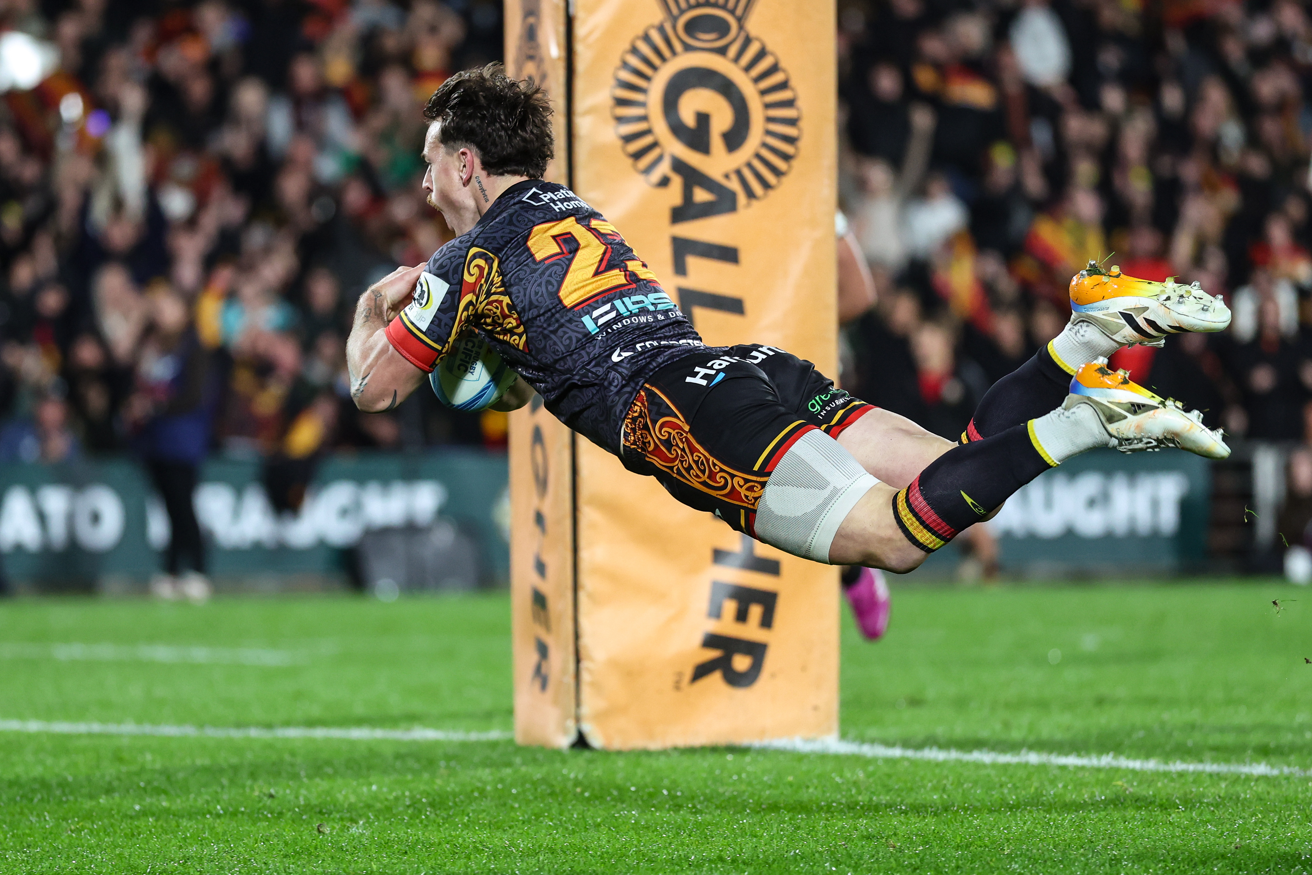 Leroy Carter of the Chiefs dives to score a try, Chiefs v Crusaders, semi final match of the 2026 Super Rugby Pacific rugby union competition at FMG Stadium, Hamilton. 