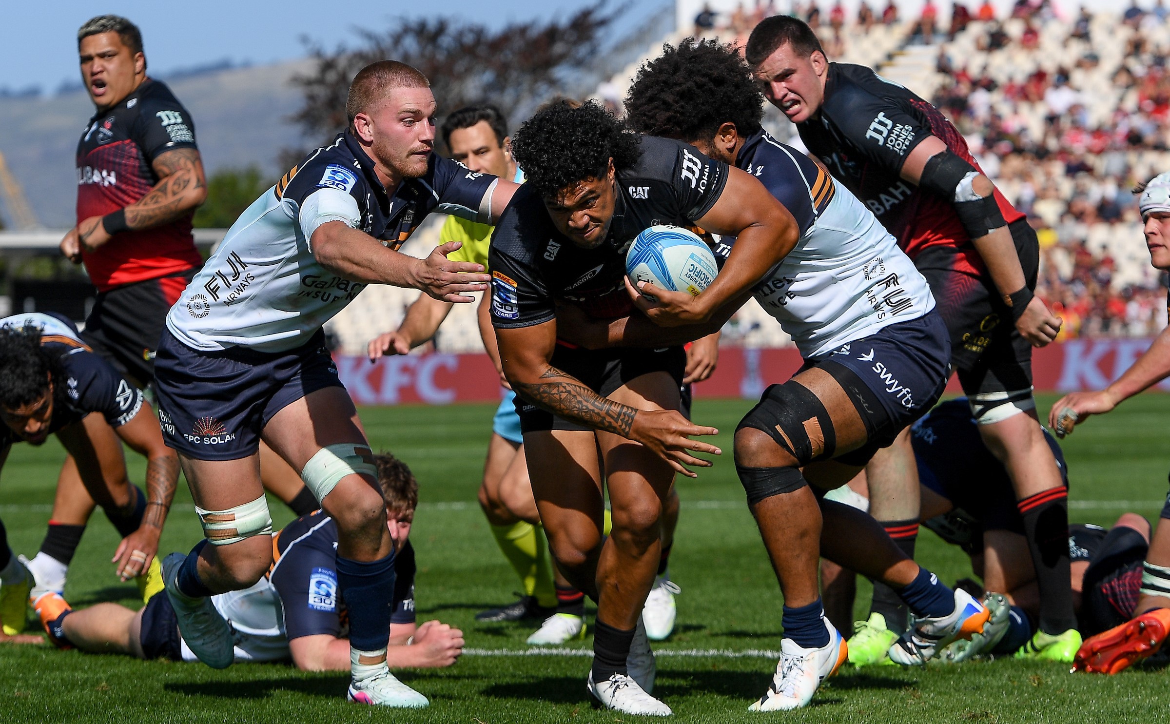 Crusaders replacement Leicester Fainga'anuku charges for the line during his team's defeat to the Brumbies.