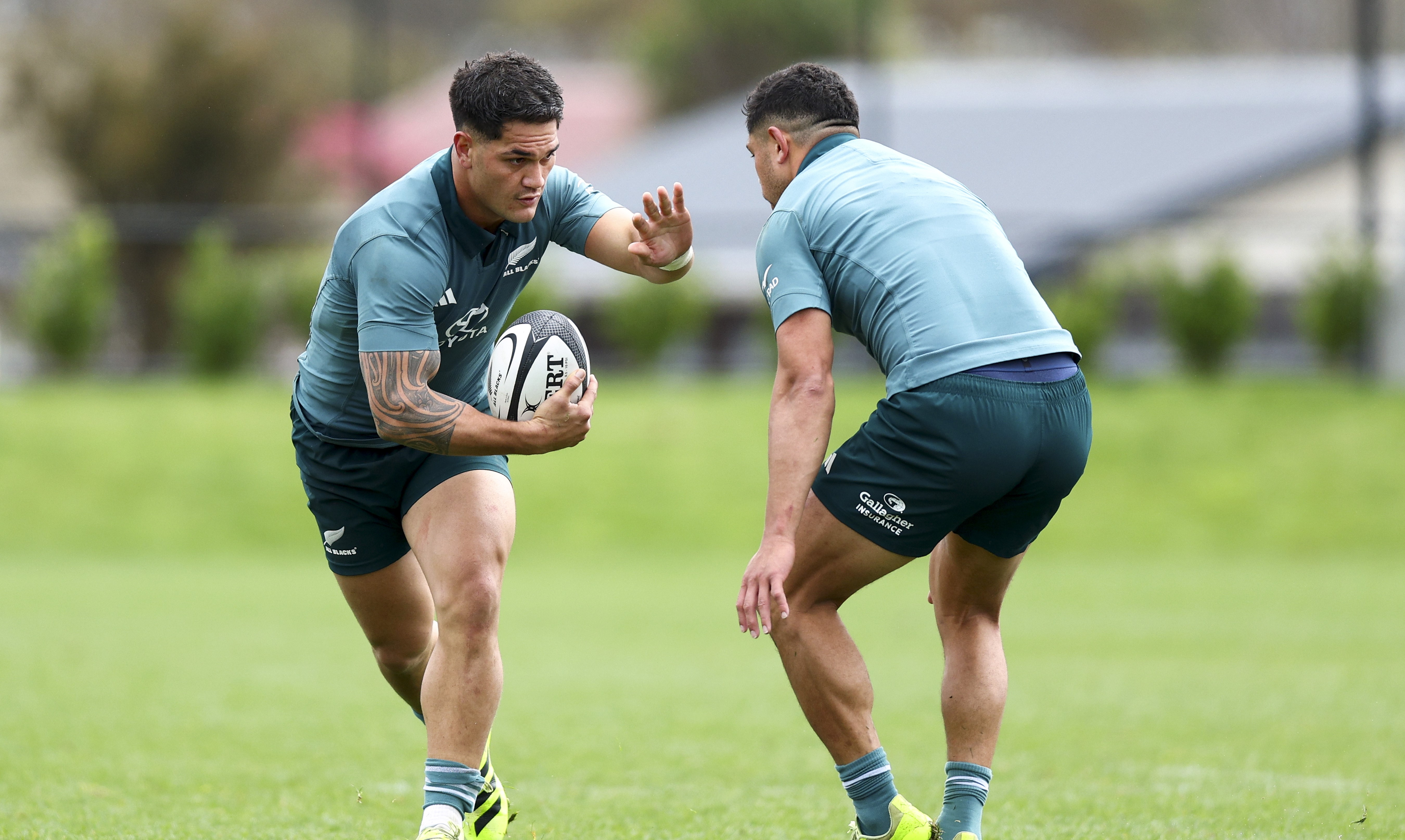 Quinn Tupaea, left, trains with the All Blacks in Wellington today.