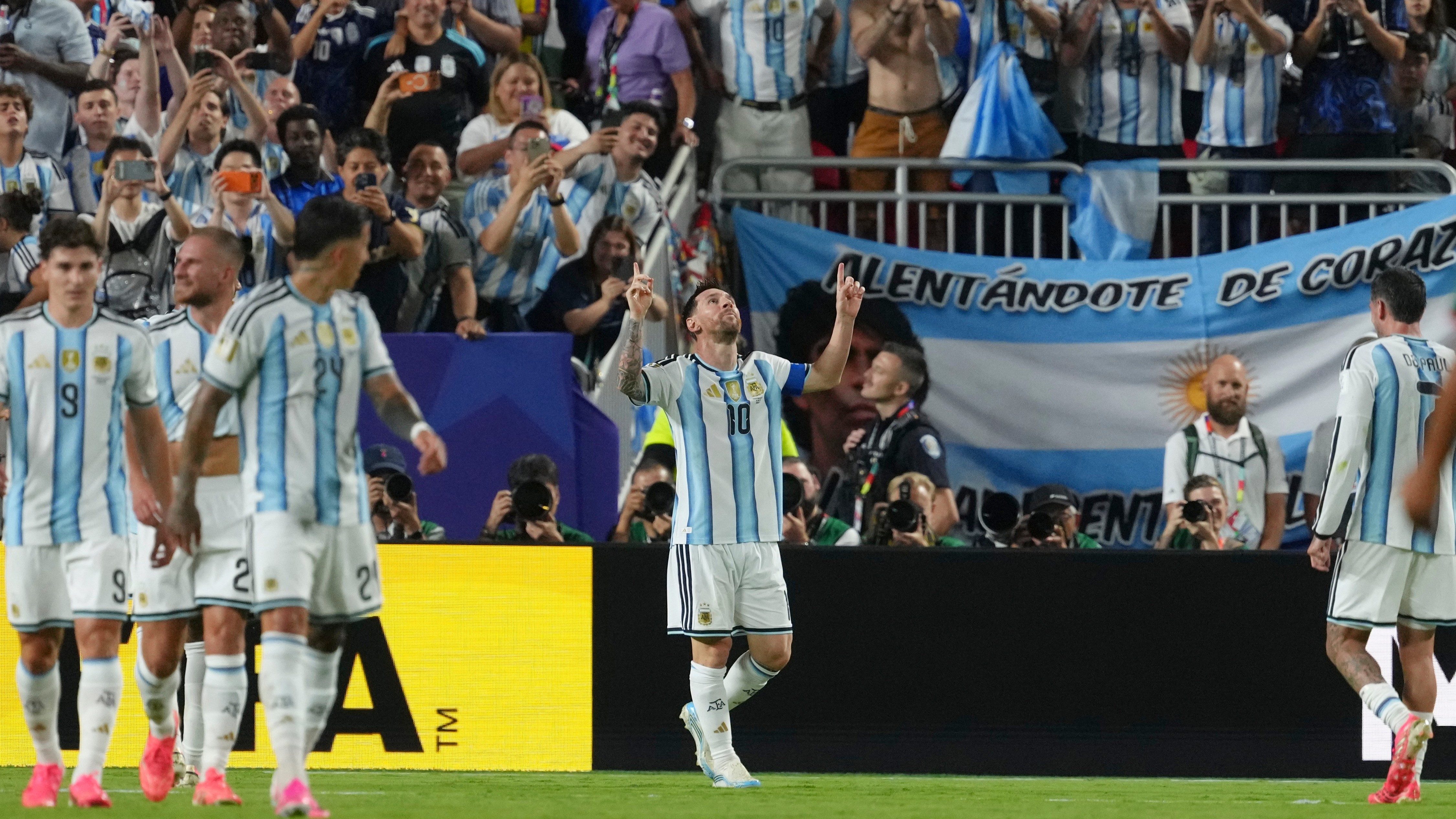 Argentina's Lionel Messi (10) celebrates after scoring his third goal during the World Cup Group J soccer match between Argentina and Algeria in Kansas City.