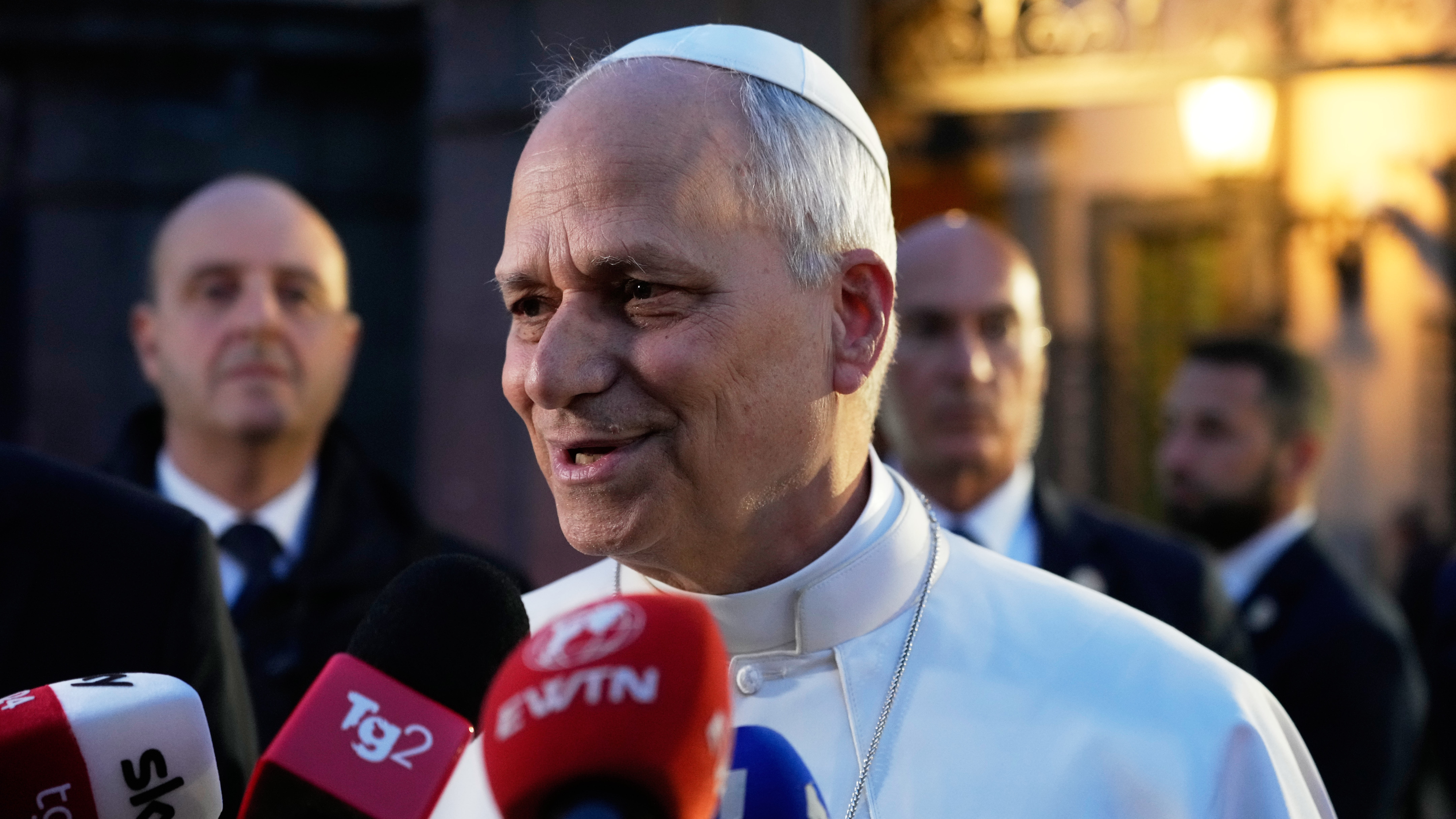 Pope Leo XIV talks to journalists as he leaves his residence in Castel Gandolfo, on the outskirts of Rome, to return to the Vatican, Tuesday, May 5, 2026.