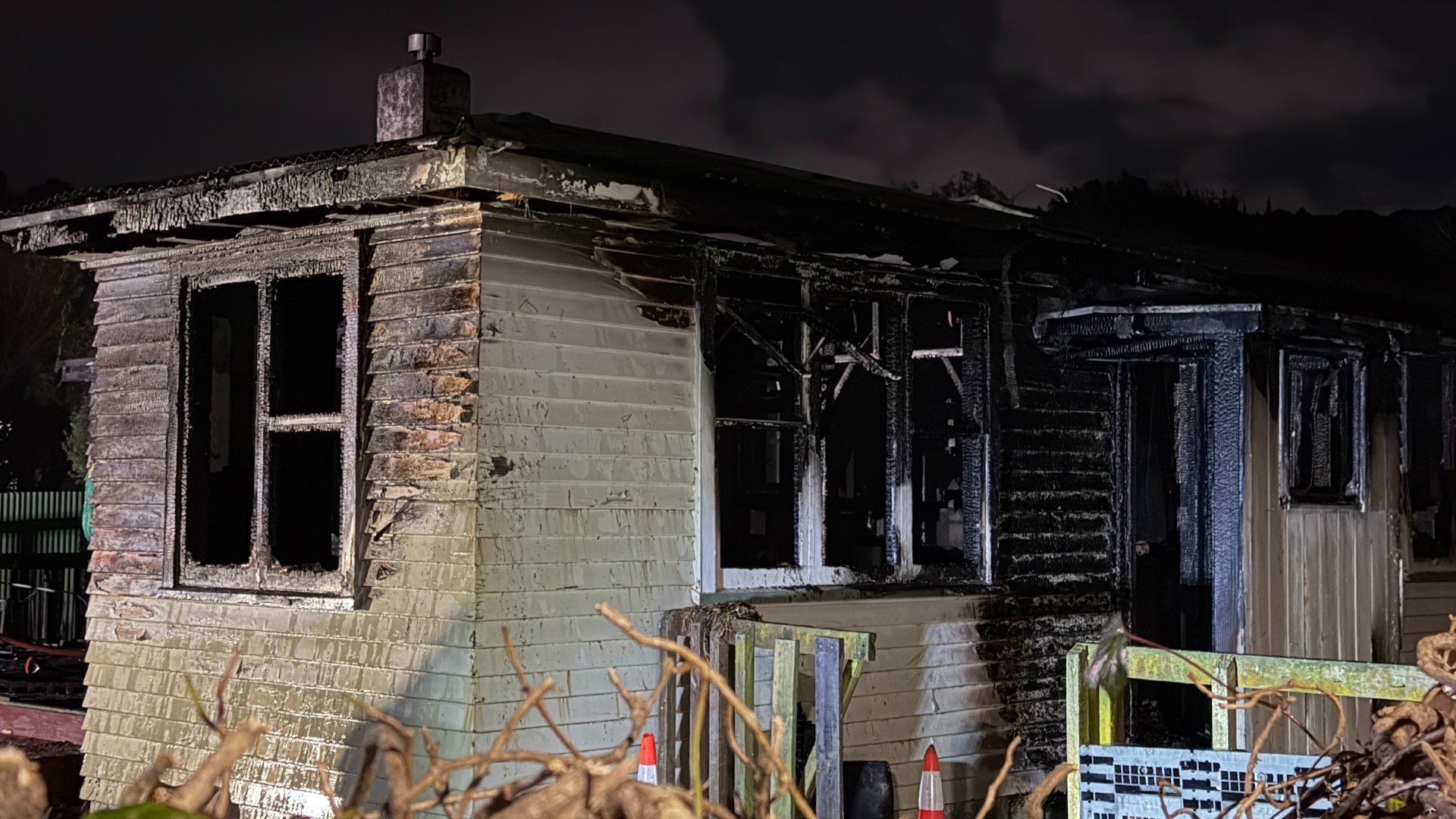 A house damaged in a fire in Stokes Valley.