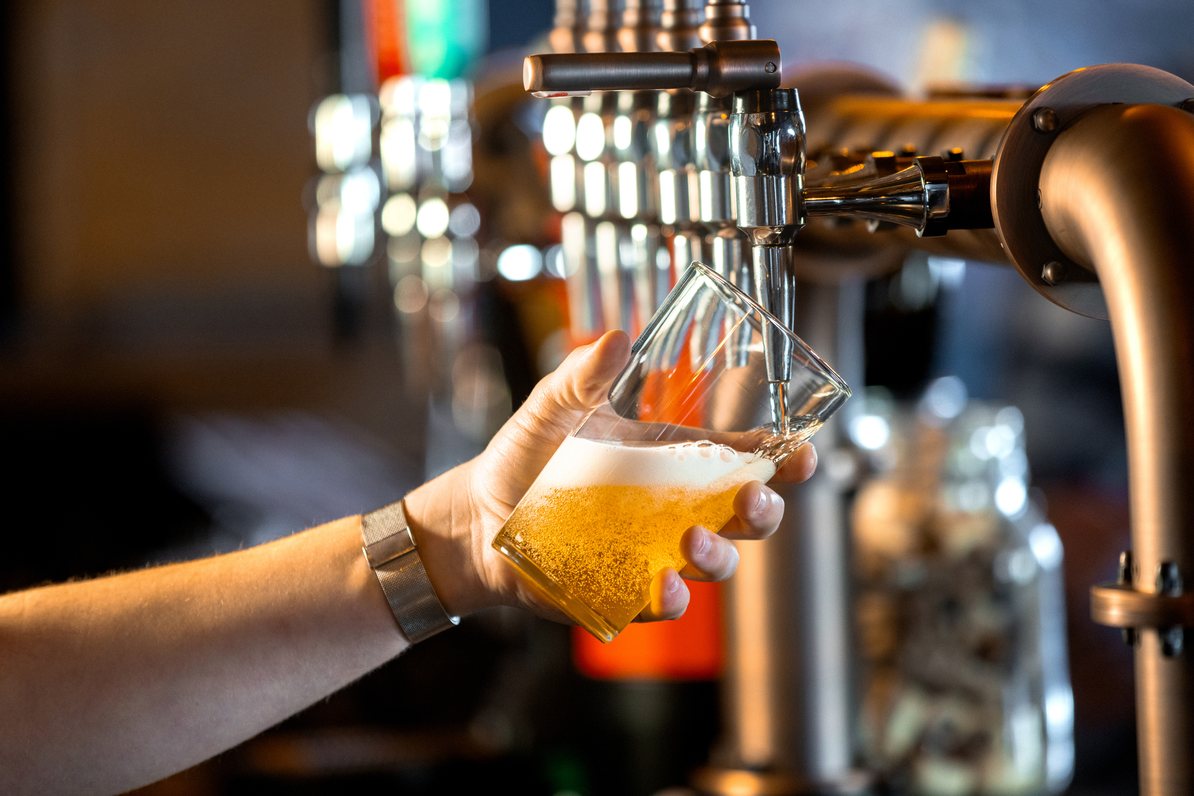 A beer being poured at a bar (stock image). 