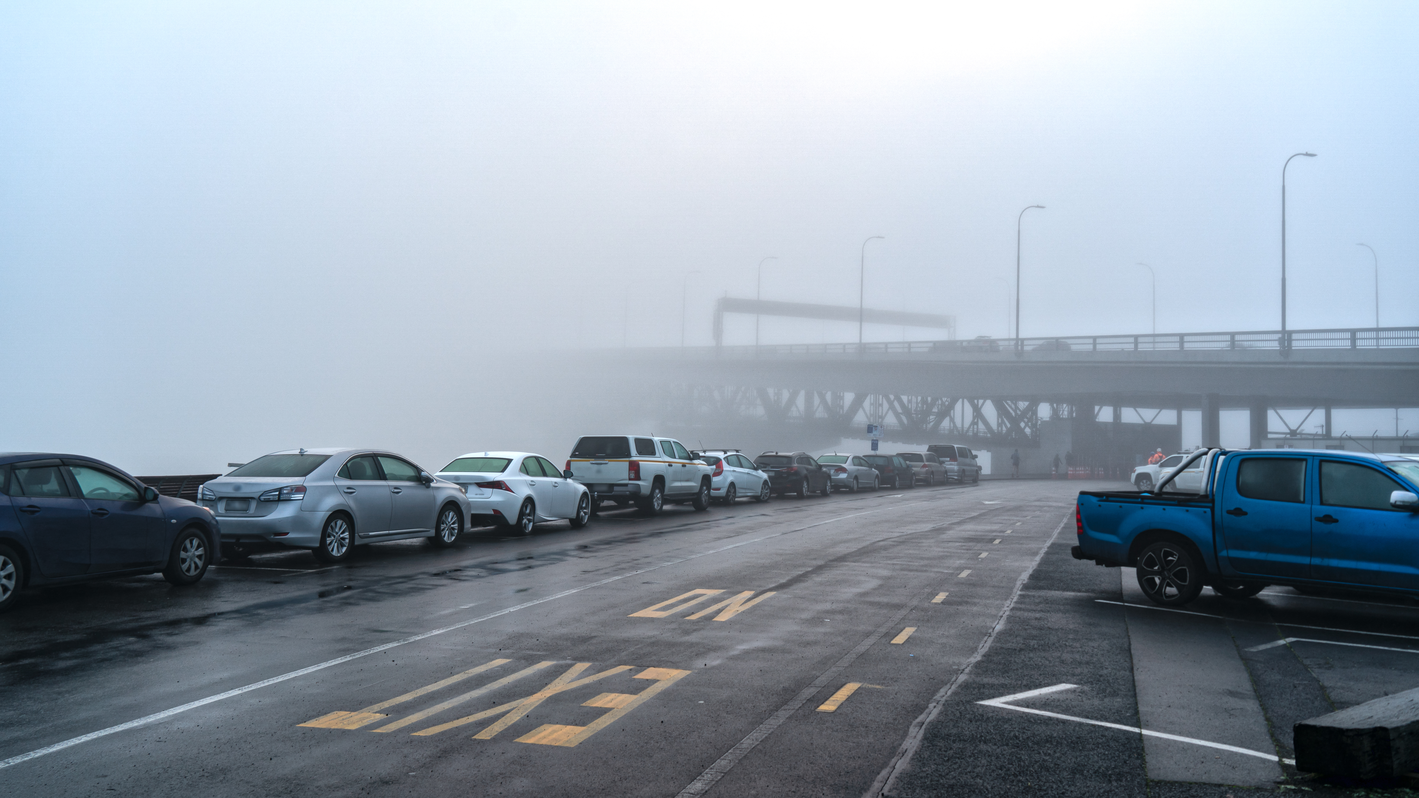The Auckland Harbour Bridge clouded by fog. 
