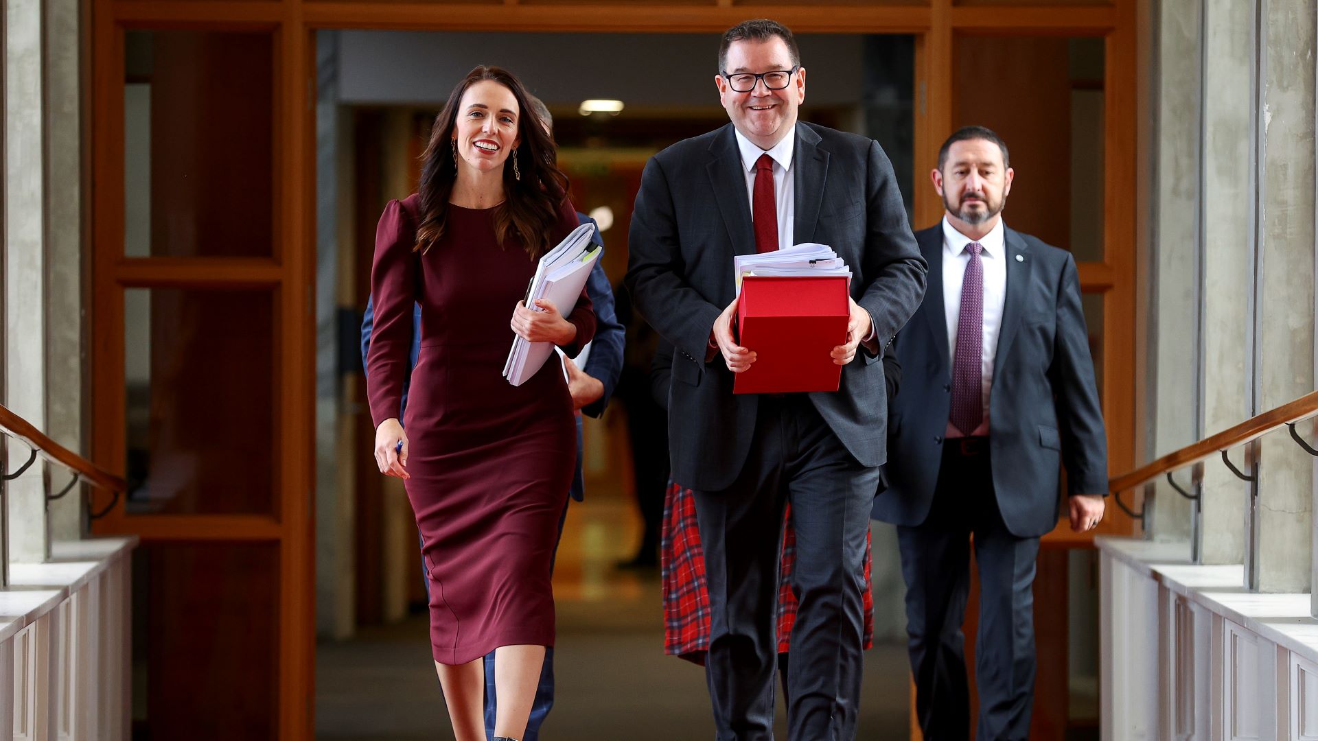 Prime Minister Jacinda Ardern and Finance Minister Grant Robertson make their way to the house during Budget Day 2021 at Parliament .