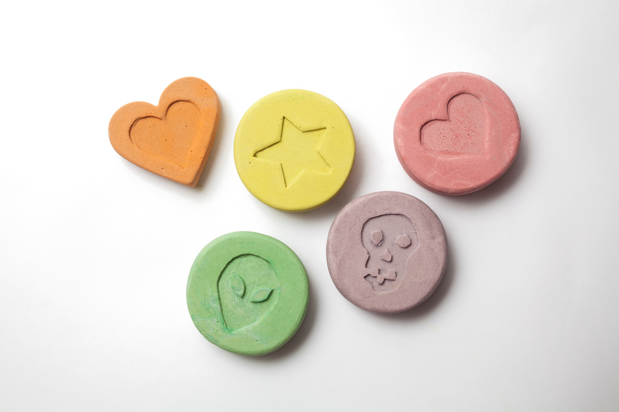 MDMA tabs on white background (file).