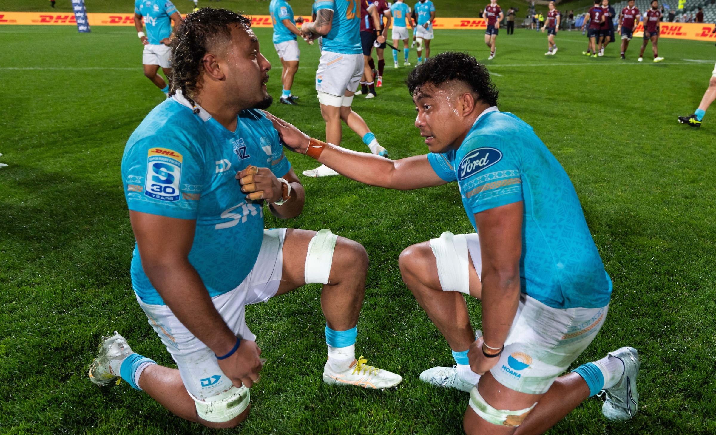 Moana Pasifika captain Miracle Faiilagi, right, with Semisi Tupou Ta'eiloa after the team's loss to the Reds in what was their final home game. 
